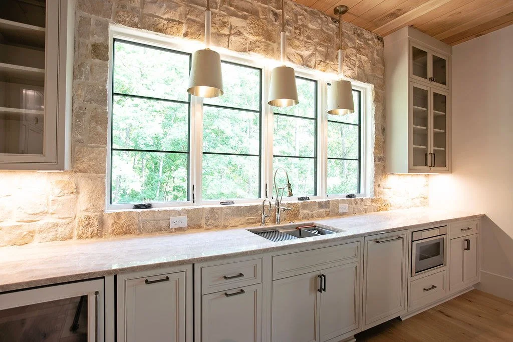 lake-oconee-scullery-stone-wall-custom-cabinets.jpg