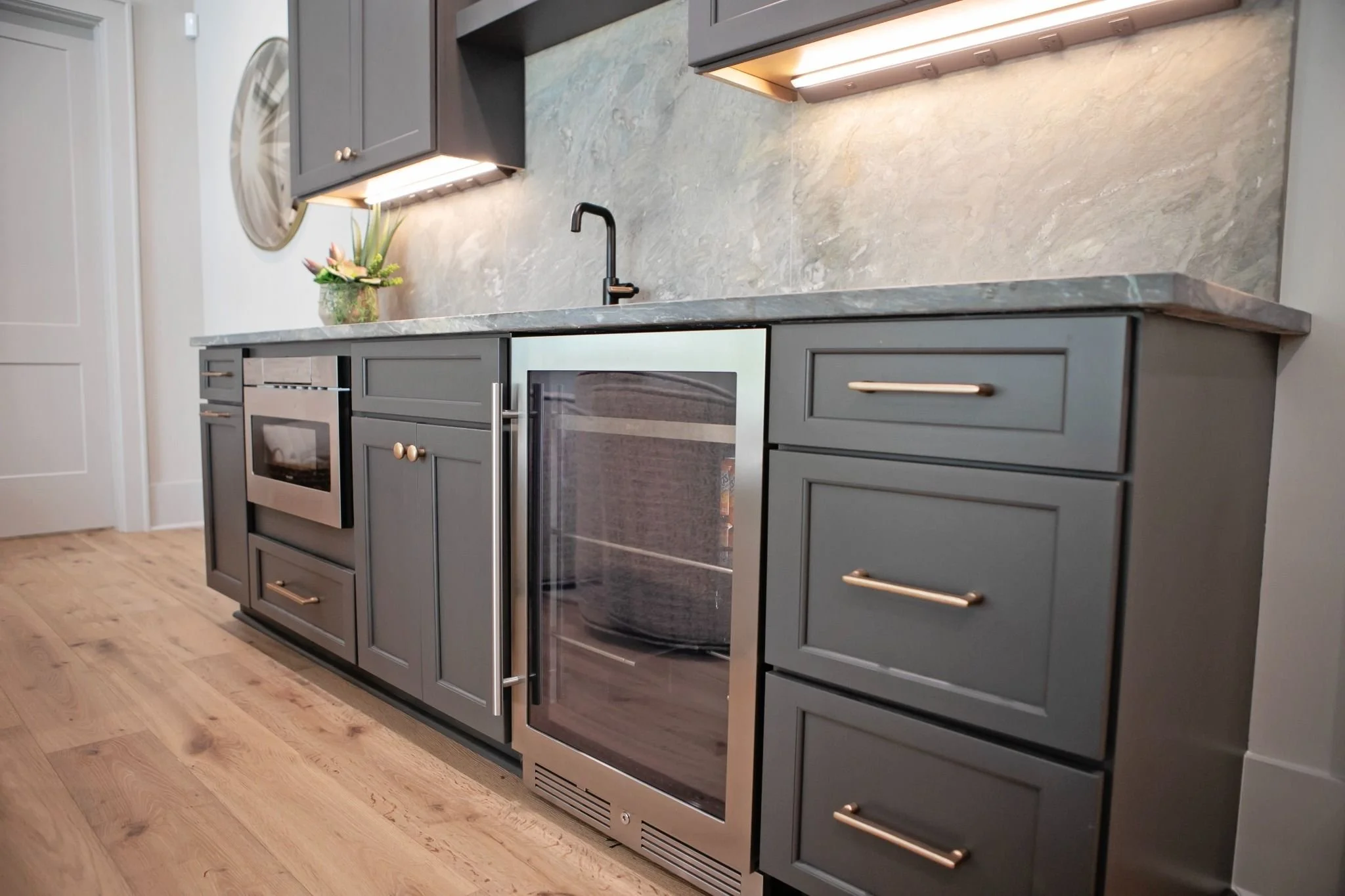 home-bar-with-beverage-fridge-custom-cabinets.jpg