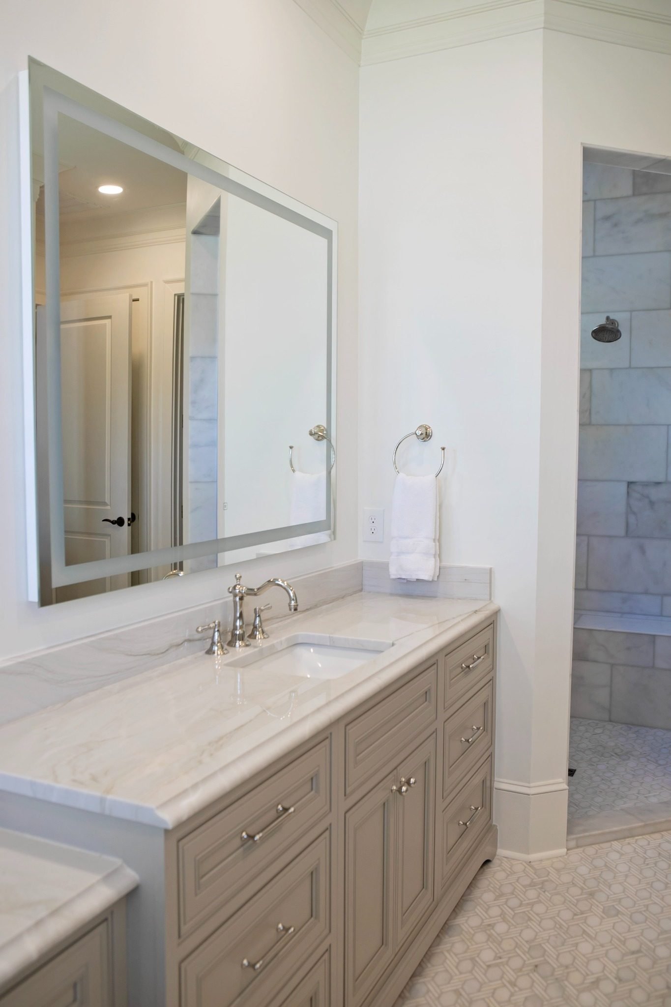 lakefront-home-bathroom-cabinetry-and-marble-countertop-detail.jpg