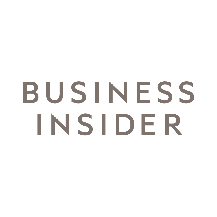 The logo of Business Insider, featuring a light bulb designed with lines and a circle, with the words "BUSINESS INSIDER" in bold gray letters below.