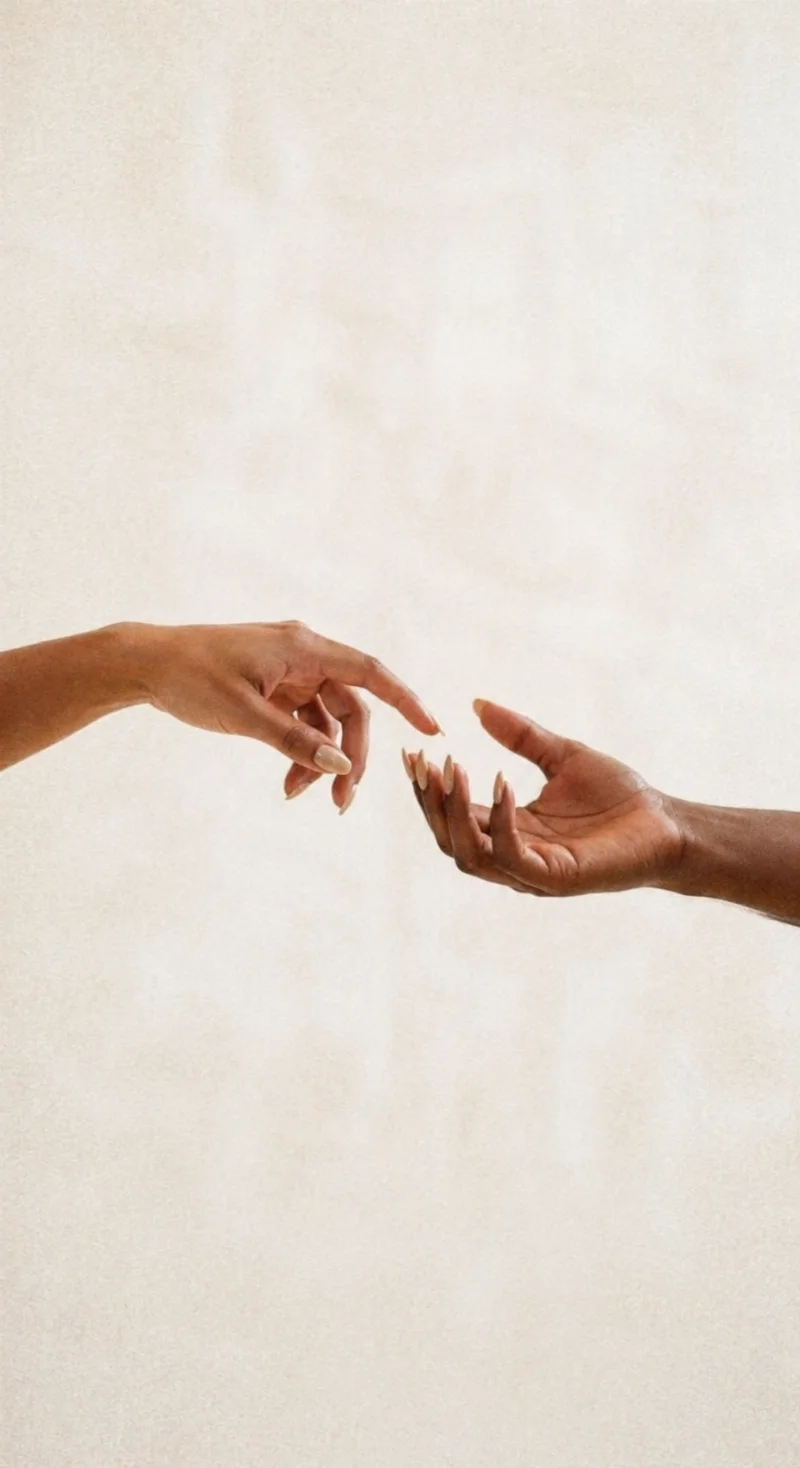 Hands reaching together representing support, business coaching and strategic guidance for women in business