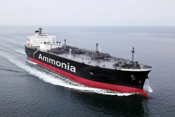 Oil tanker ship with the word 'Ammonia' written on the side, sailing in open water.