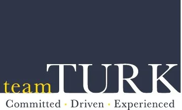 Text reading 'team TURK' with the words 'Committed', 'Driven', and 'Experienced' below, on a dark background.