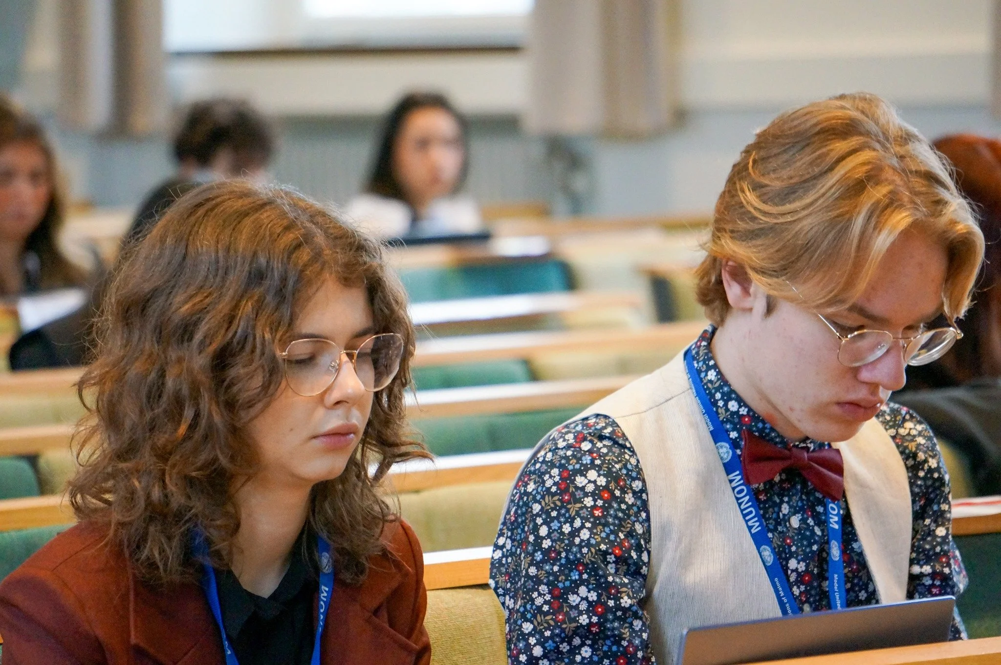 Competitors focused on work during classroom session.