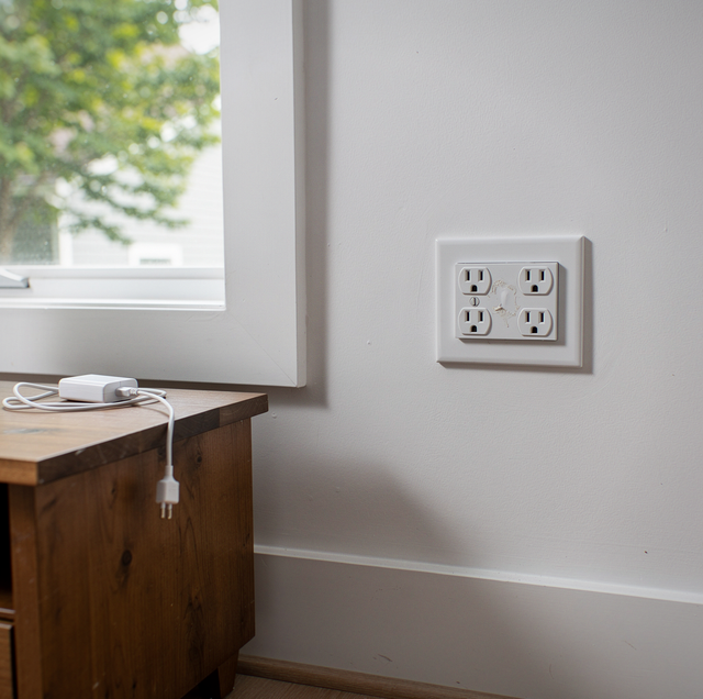 smoked outlet with scorched plastic wall plate