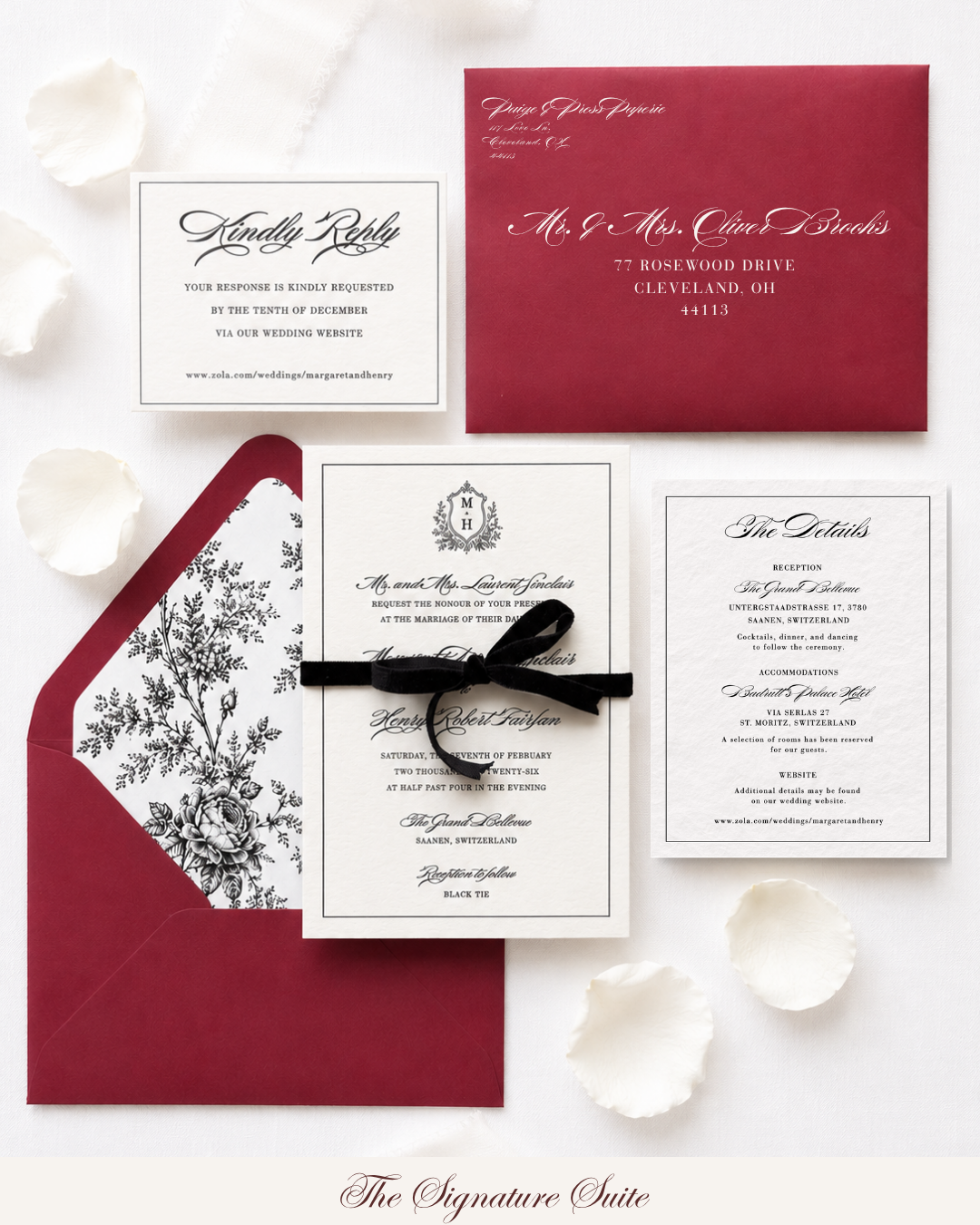 Paige & Press St. Moritz Collection luxury letterpress wedding invitation suite featuring deep red envelopes, floral vellum wrap, black velvet ribbon, wax seal, and heirloom-inspired details.
