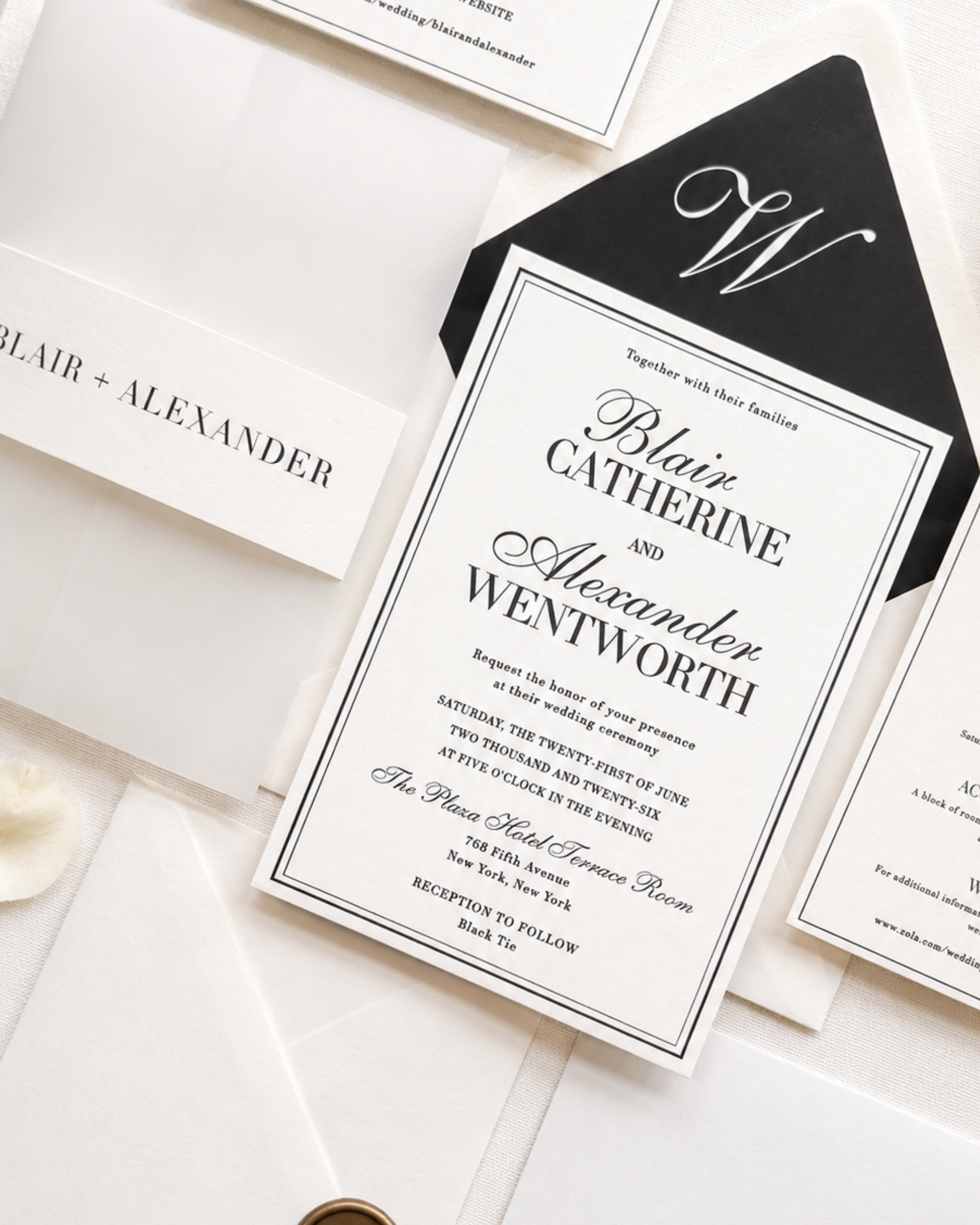 Paige & Press Sample Experience featuring a luxury keepsake box with custom monogram, black pocket folder, burgundy ribbon, and curated letterpress wedding stationery.