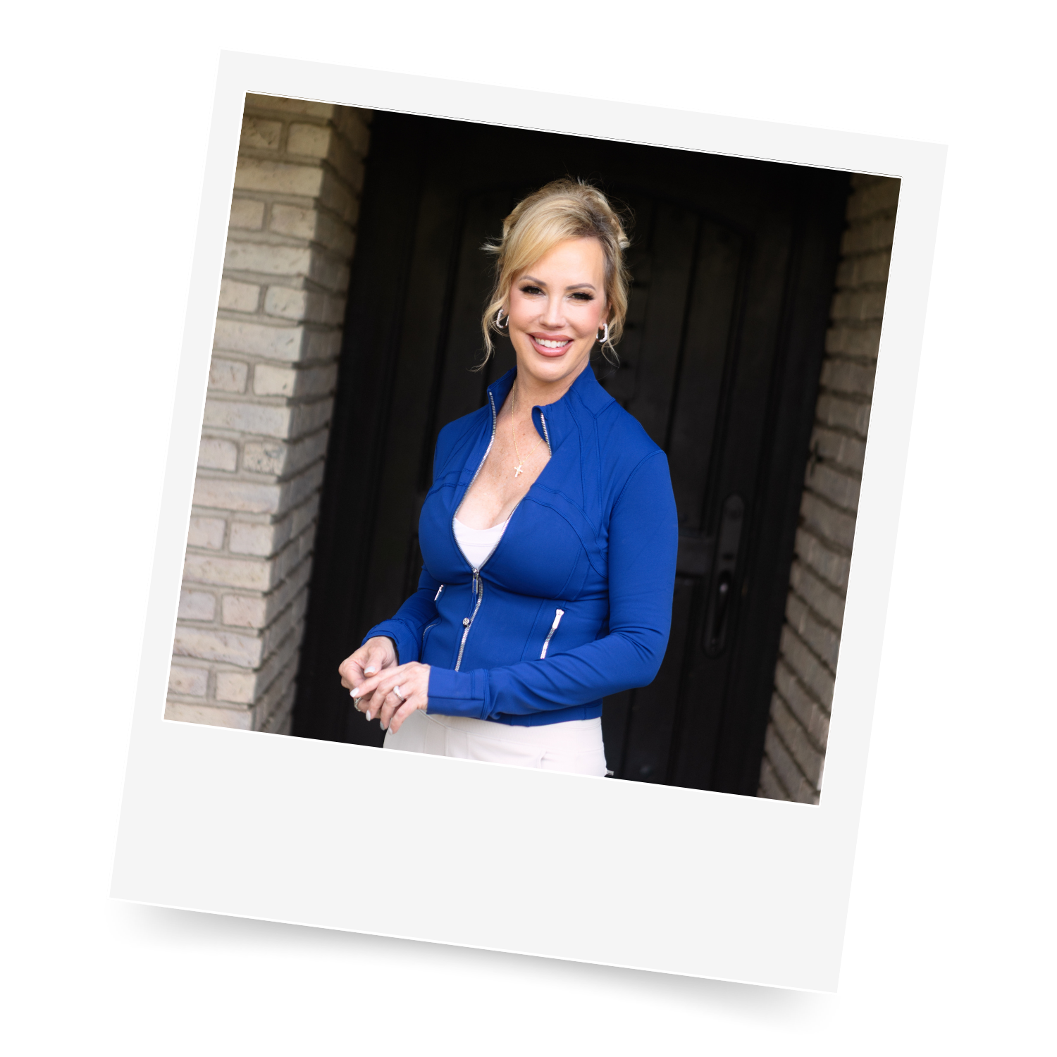 Polaroid of Sarah Engelhardt in a blue top and light pants for walking