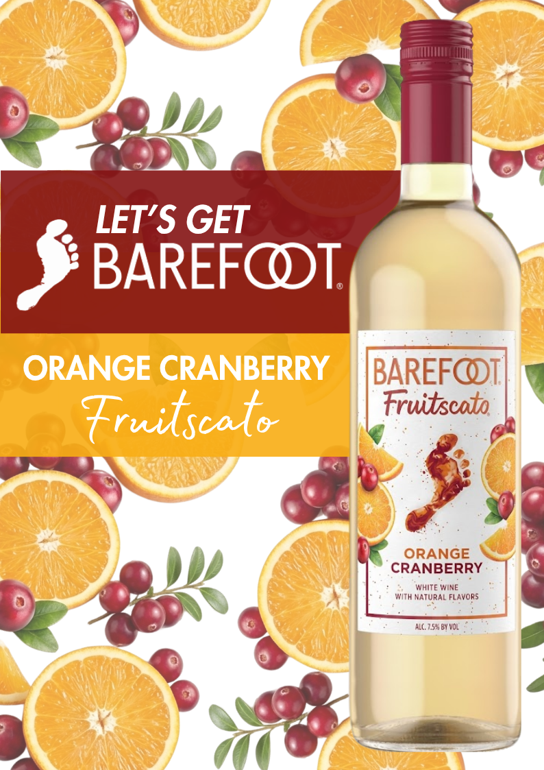 A bottle of Barefoot Fruitscato orange cranberry wine with orange slices and cranberries in the background.