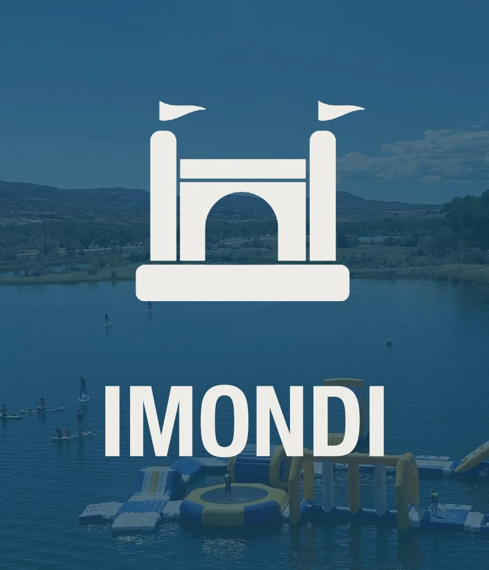 Logo of Imoni featuring a stylized castle with flags, set against a lake scene with people on water inflatables and paddleboards, and distant hills.