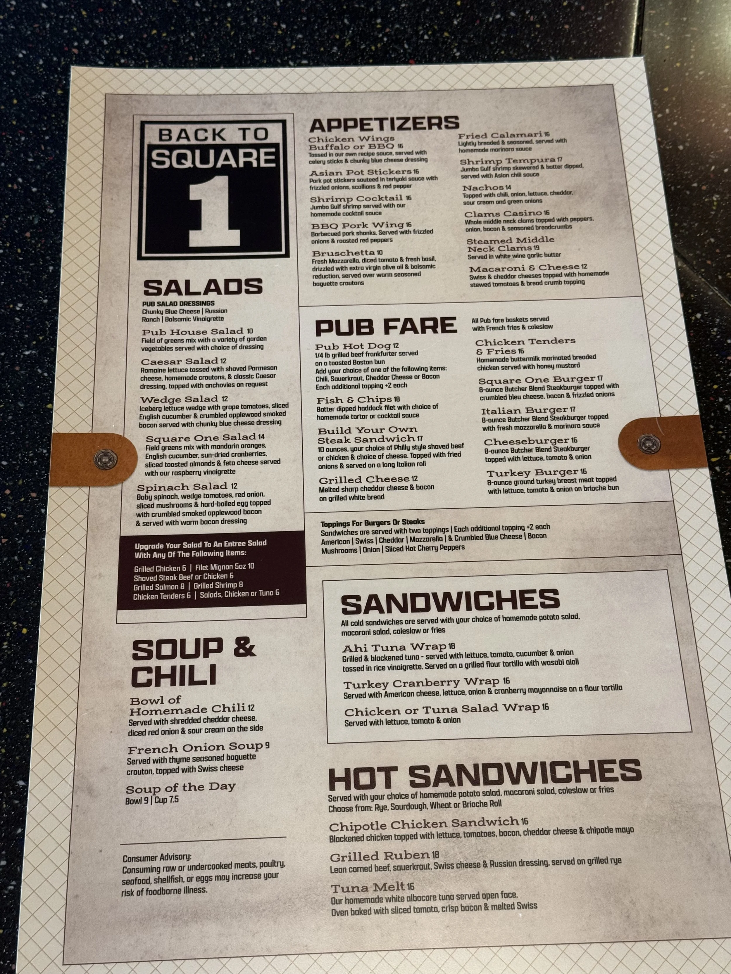 Restaurant menu page listing appetizers, salads, pub fare, sandwiches, and hot sandwiches, with prices and descriptions.