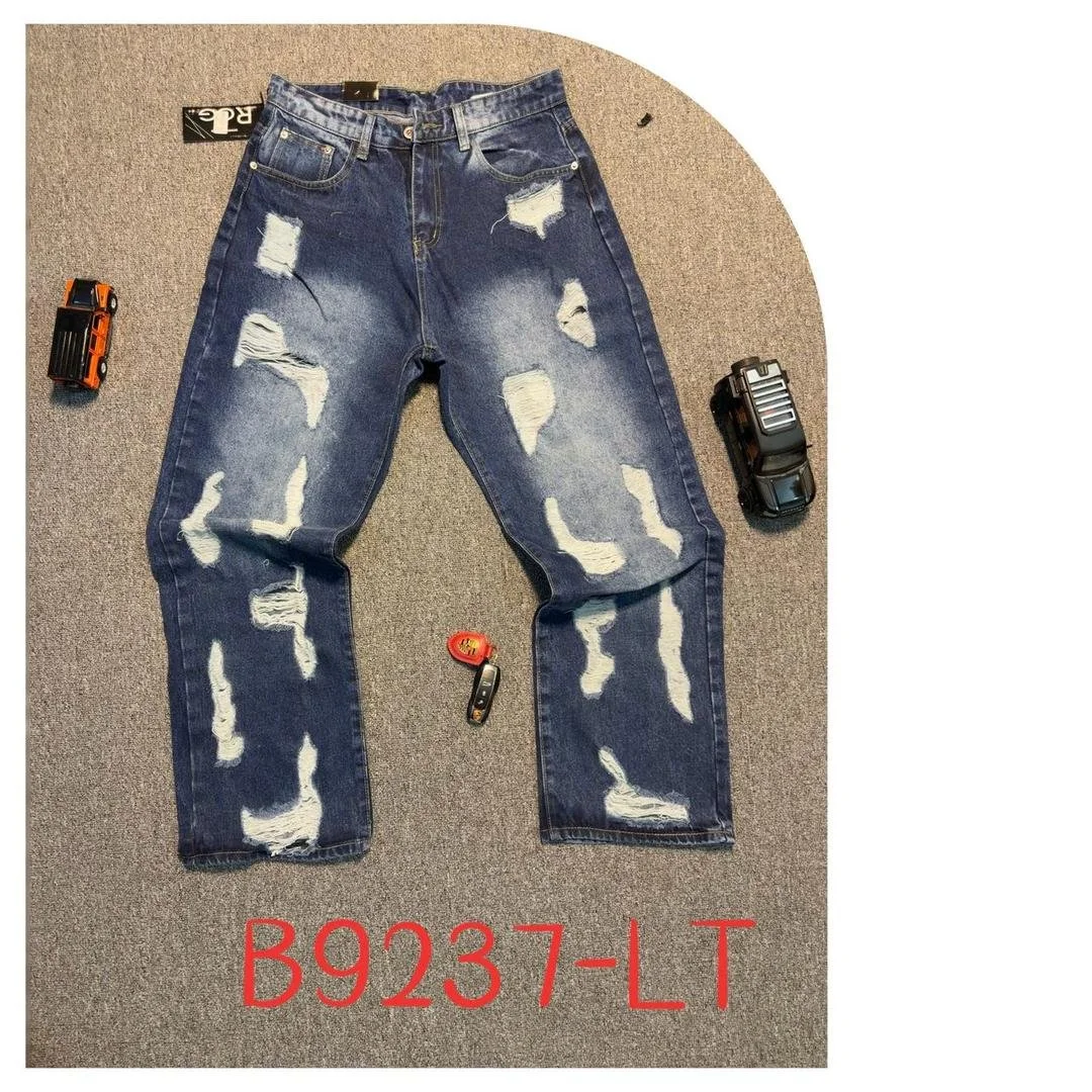 Pair of distressed blue jeans with ripped patches, surrounded by toy vehicles and a car key on a gray carpet. Red text reads 'B9237-LT'.