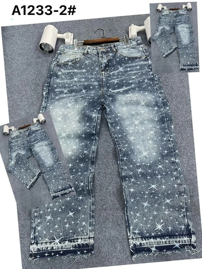 Pair of blue jeans with a starry galaxy pattern, displayed on a hanger. Additional images show close-ups of the same jeans, highlighting the pattern and distressed details.