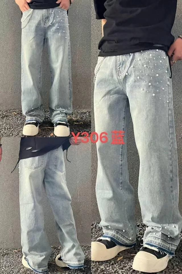 Three different angles of light-wash, wide-leg jeans with pearl embellishments on the front, worn by a person with their hands in their pockets, against a gray wall and ground.