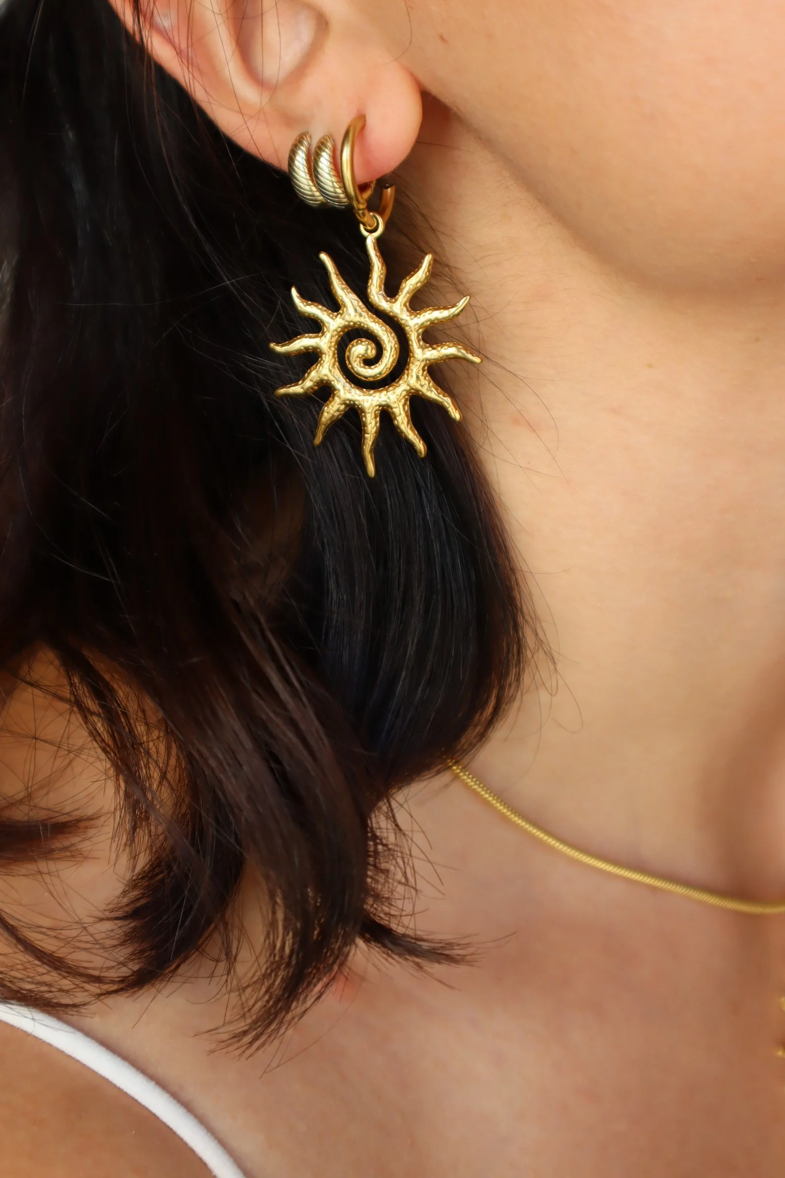 Brincos Sol