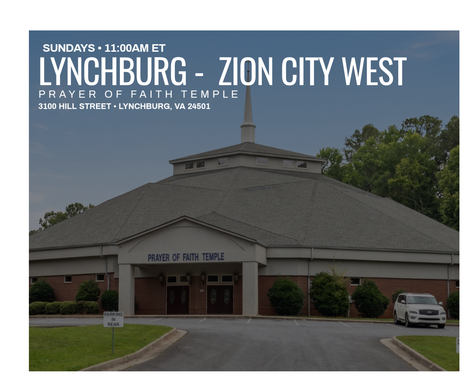 Front view of Prayer of Faith Temple church with a large, round gray roof, church sign reading "PRAYER OF FAITH TEMPLE," and a parking lot with a white car, green bushes, and a sign indicating "PARKING IN REAR."
