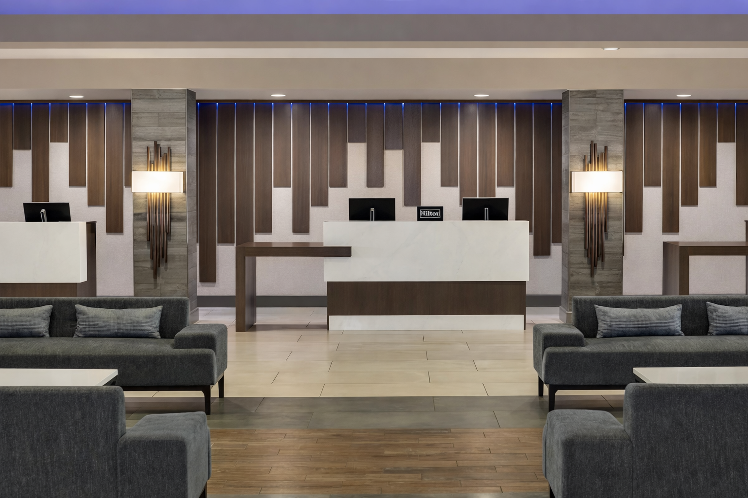 Modern hotel reception with elegant design.png