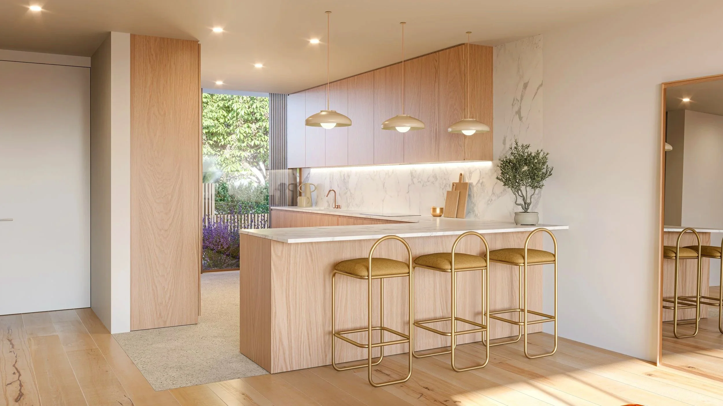 Modern kitchen with light wood cabinets, a white marble backsplash, and a kitchen island with four gold barstools. Plants and hanging pendant lights add decor.