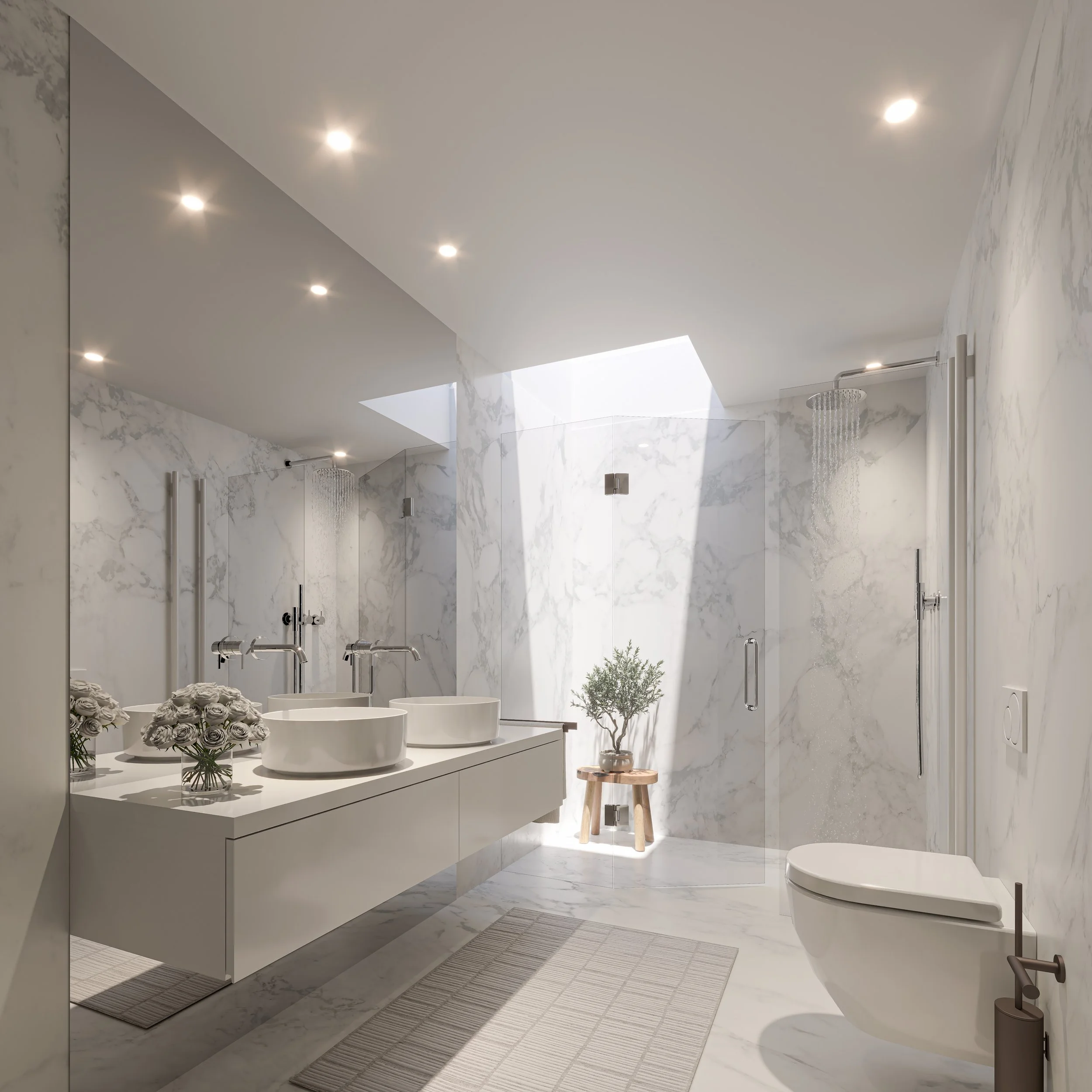 Modern bathroom with white marble walls and floor, featuring a toilet, a vanity with two sinks, a large mirror, a small potted plant, and a shower area with ceiling-mounted rain shower head. Recessed ceiling lights provide illumination.