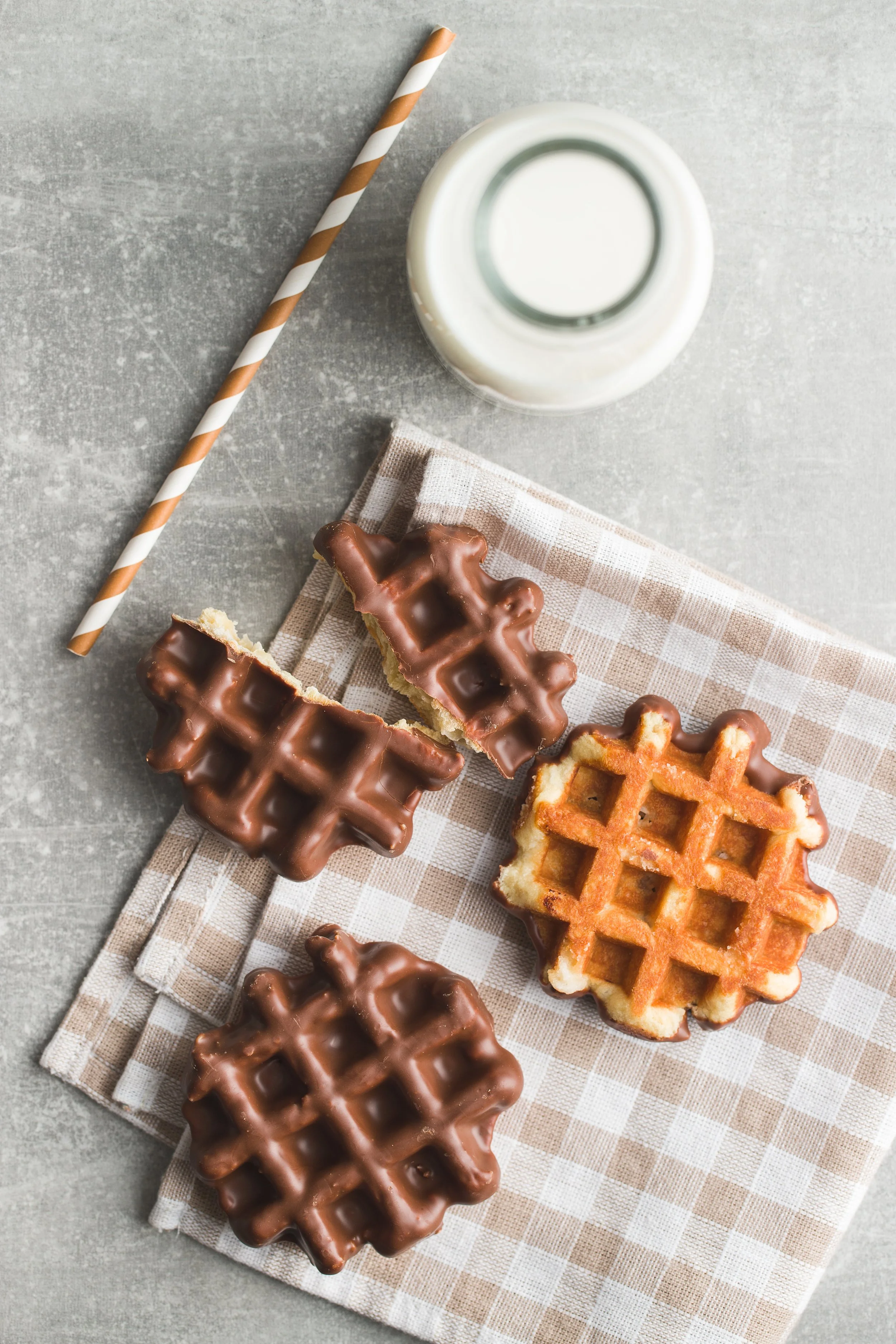 liege waffle dipped in belgian chocolate with a side of milk 