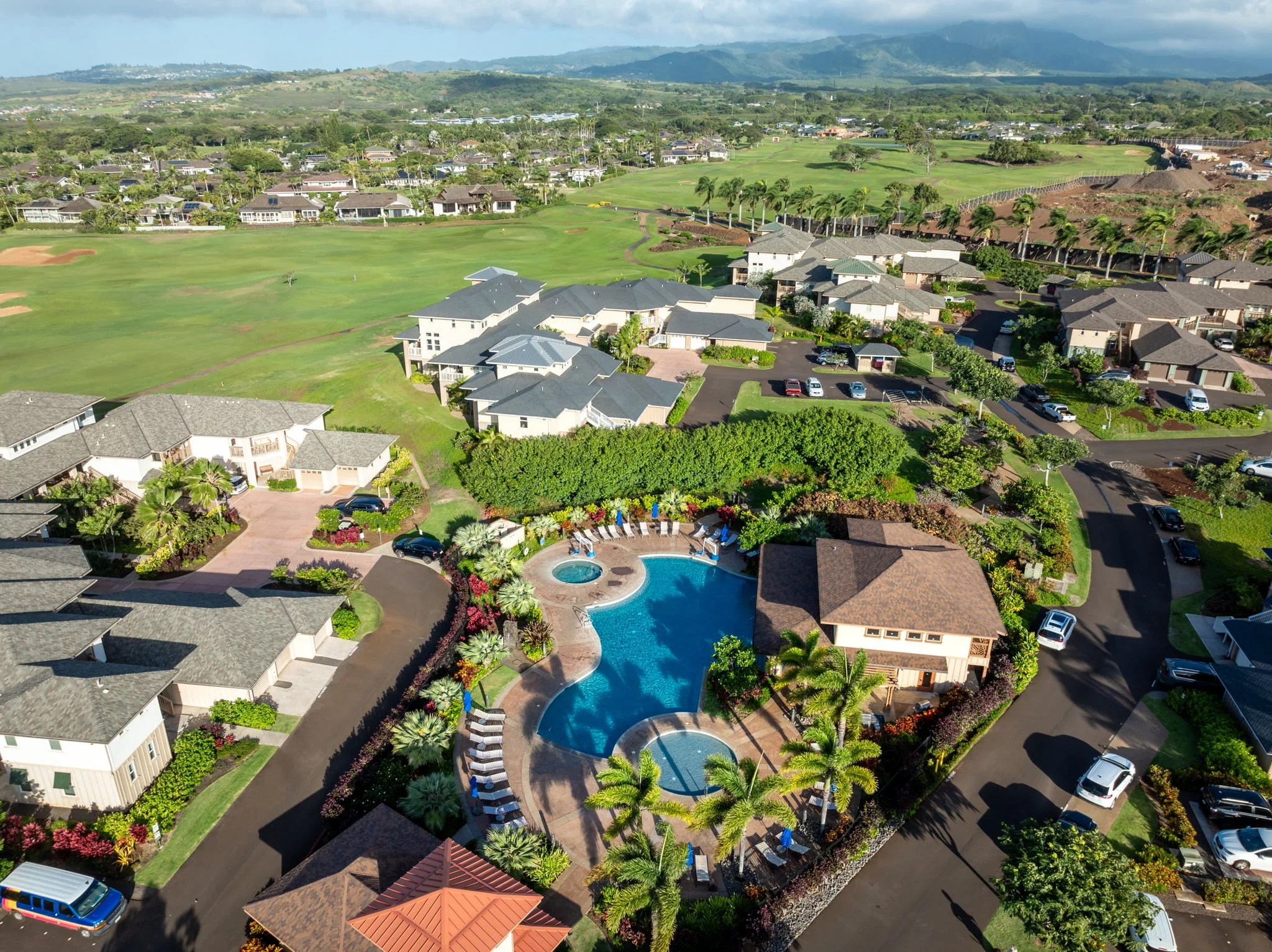 Aerial view of Pili Mai, community pool, and Kiahuna Golf Course
