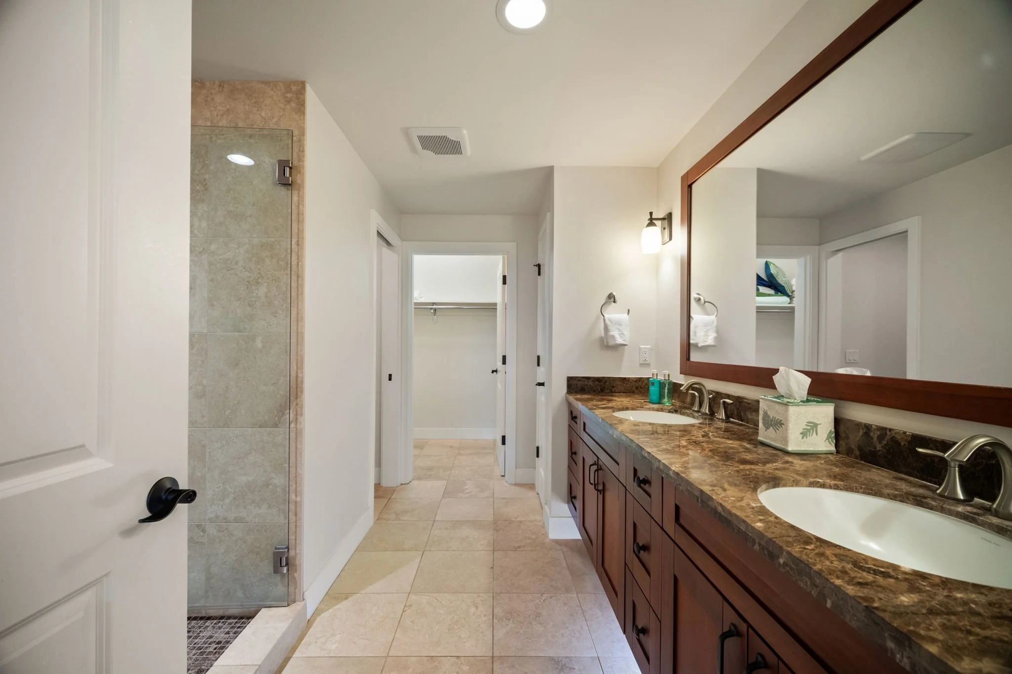 Master en-suite with walk-in shower and stone tile