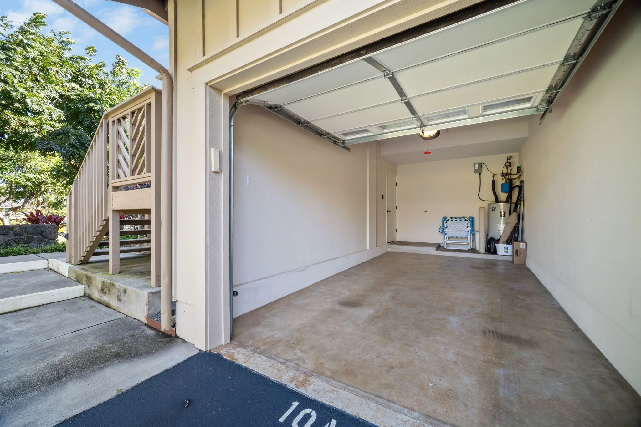 Enclosed garage with room for golf club storage and beach gear