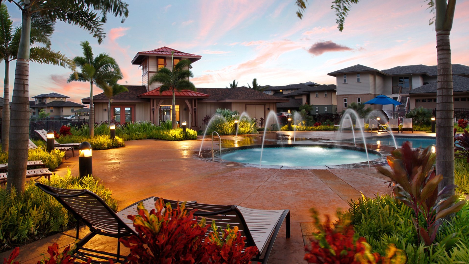 Children's pool and water features at sunset