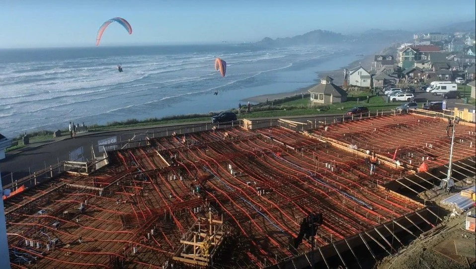 A post-tension concrete slab was poured during construction, an advanced structural technique that made it possible to include additional parking spaces in the garage below.