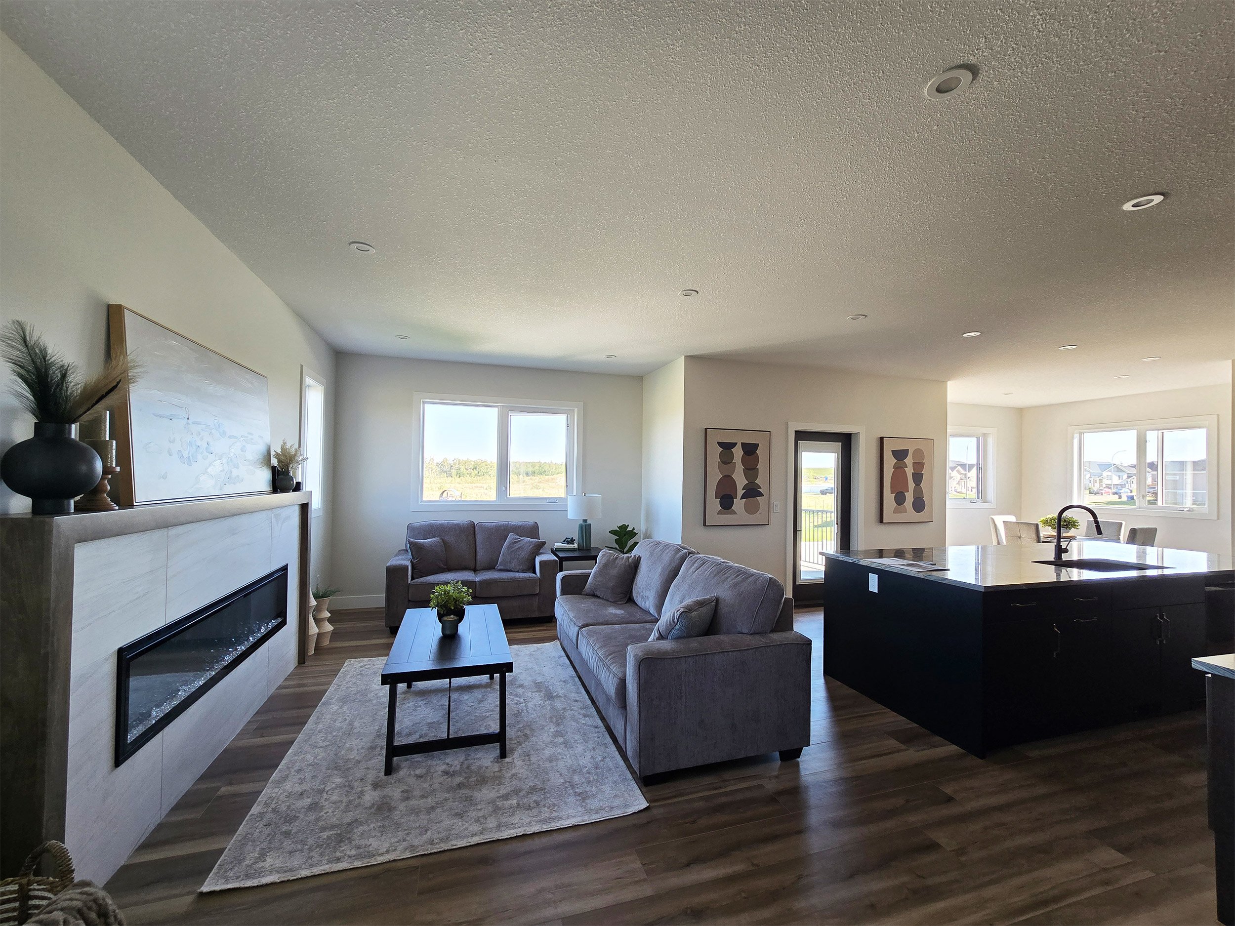 ridgestone-custom-homes-22-aura-drive-blackfalds-Kitchen-livingroom-dining.jpg