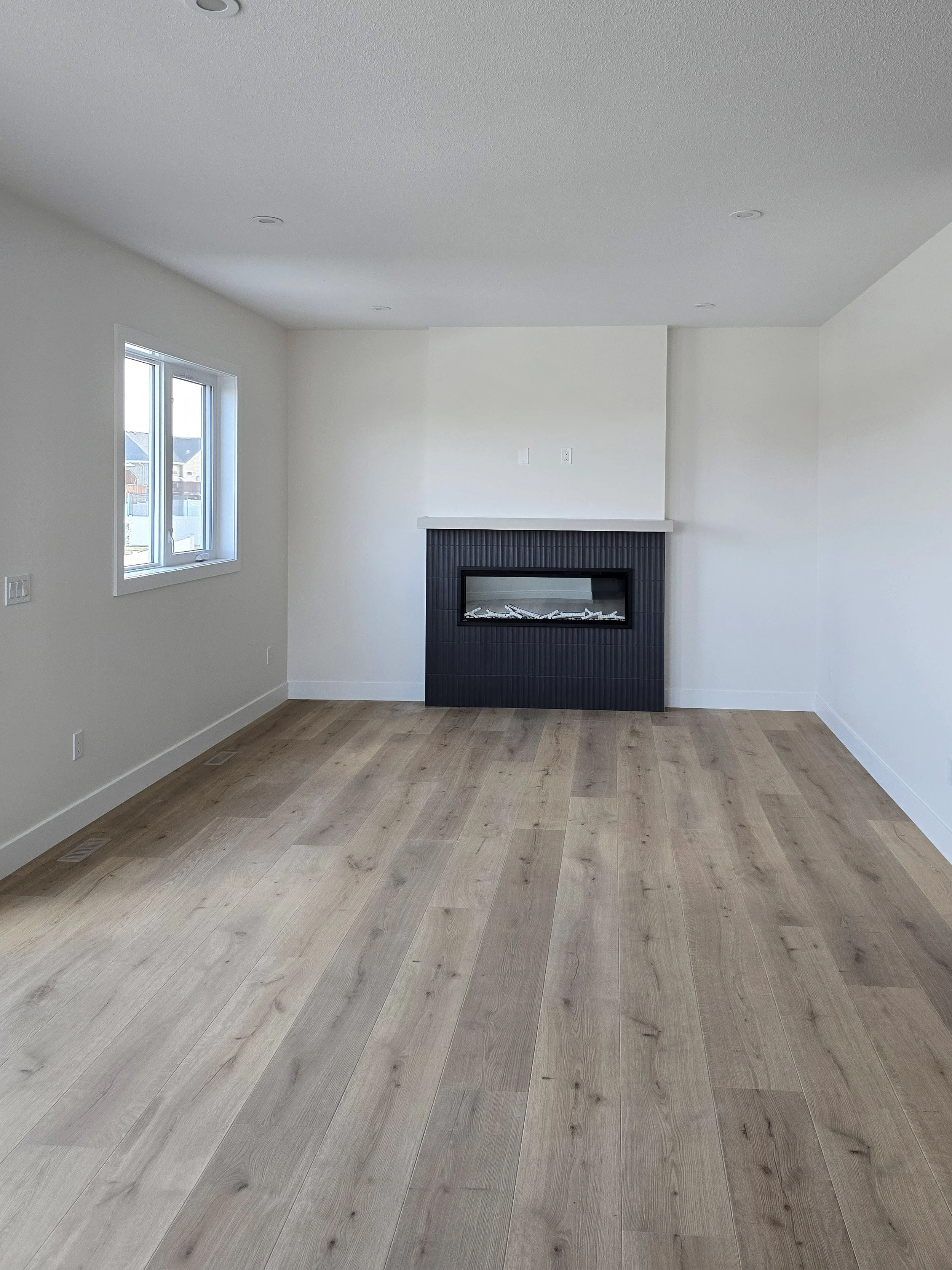 ridgestone-custom-homes-10-aura-drive-blackfalds-livingroom.jpg