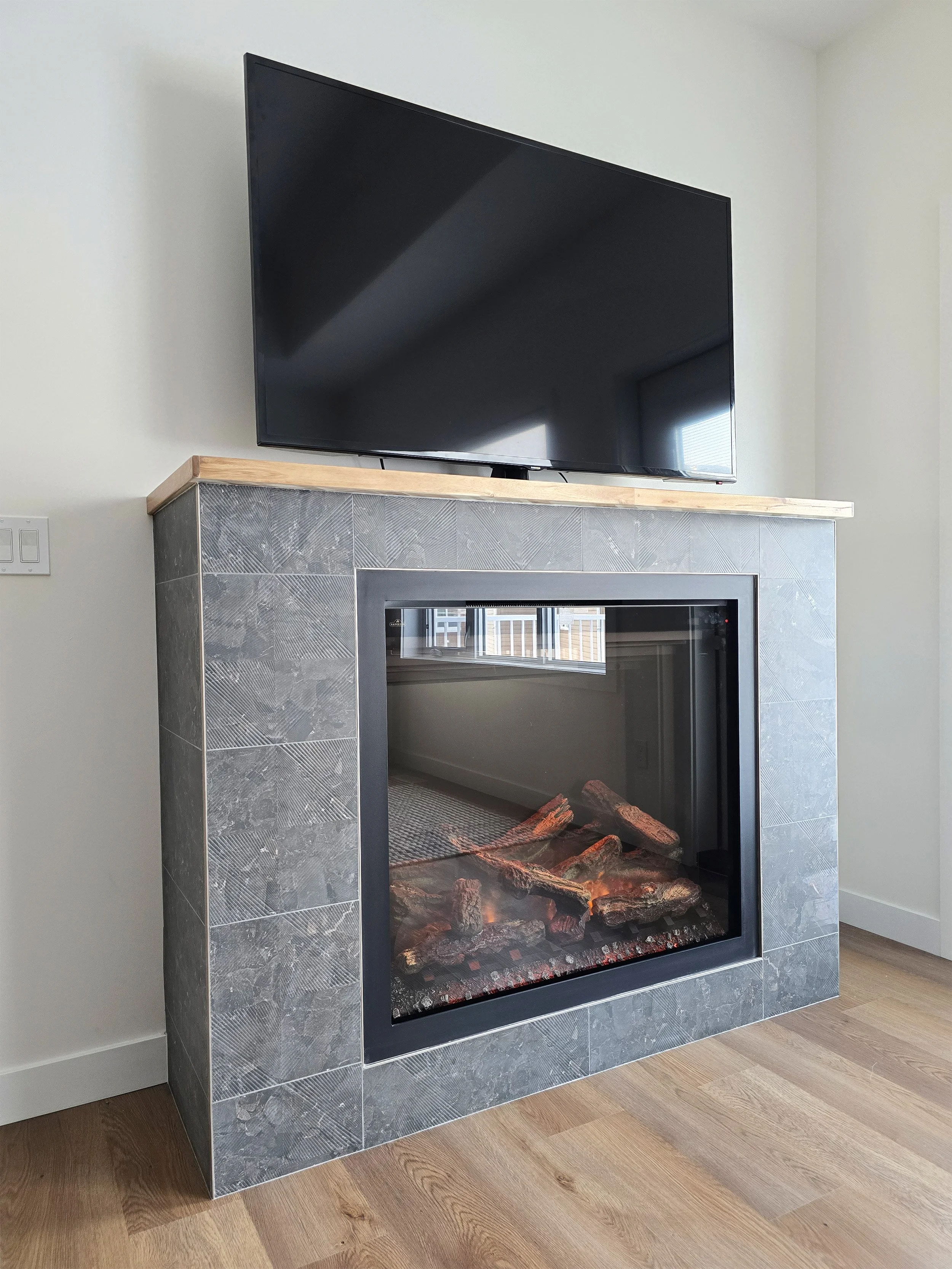 ridege-stone-homes-4930-4932-beardsley-lacombe-alberta-duplex-fireplace.jpg