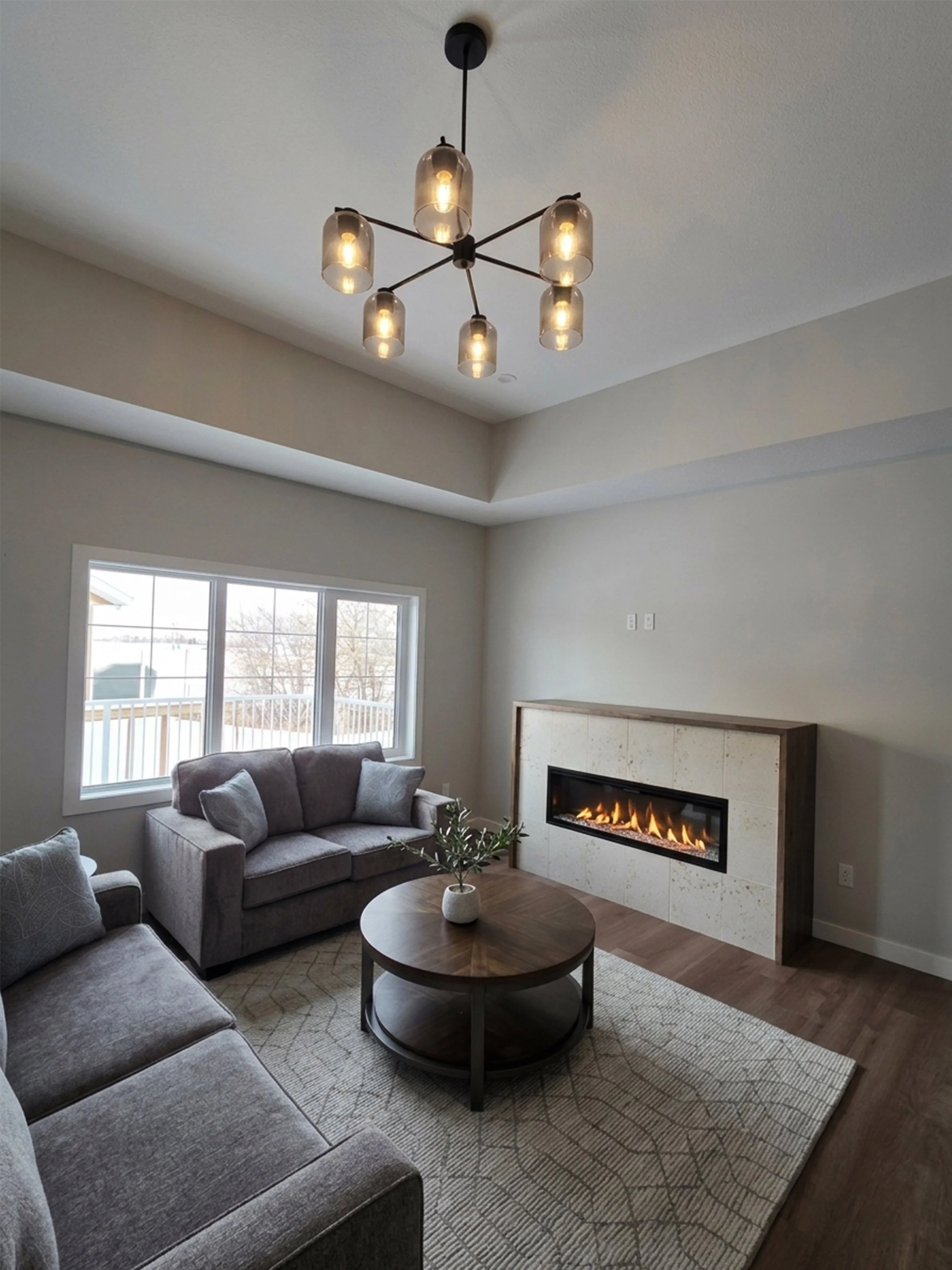 ridege-stone-homes-4922-4924-beardsley-lacombe-alberta-duplex-livingroom-fireplace.jpg