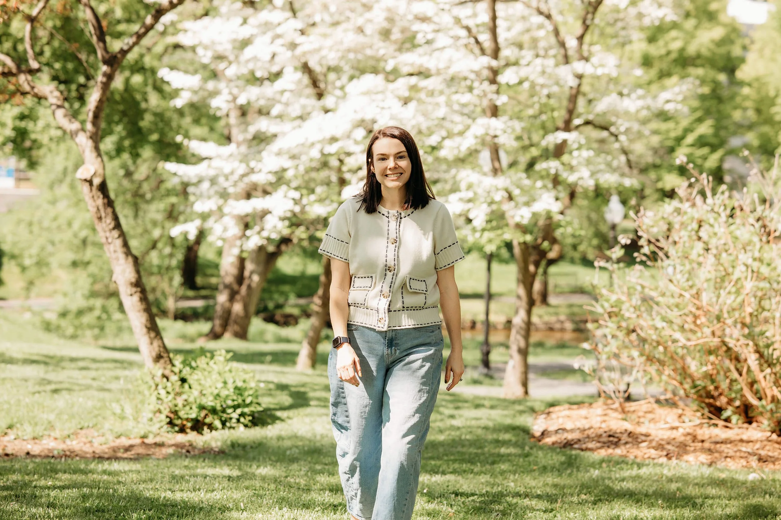 Dr. Hillary Ammon walking through gardens