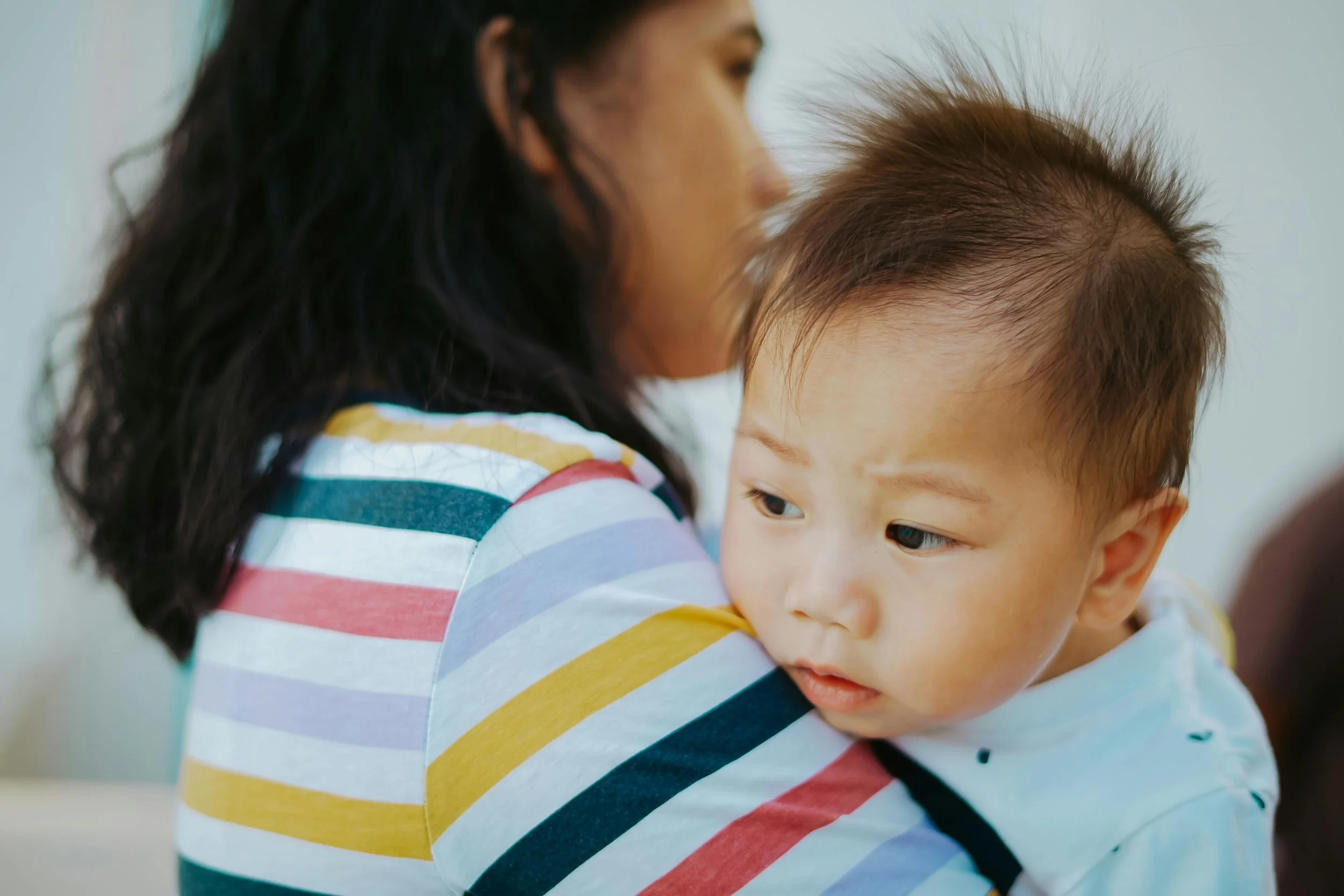 Woman holding toddler