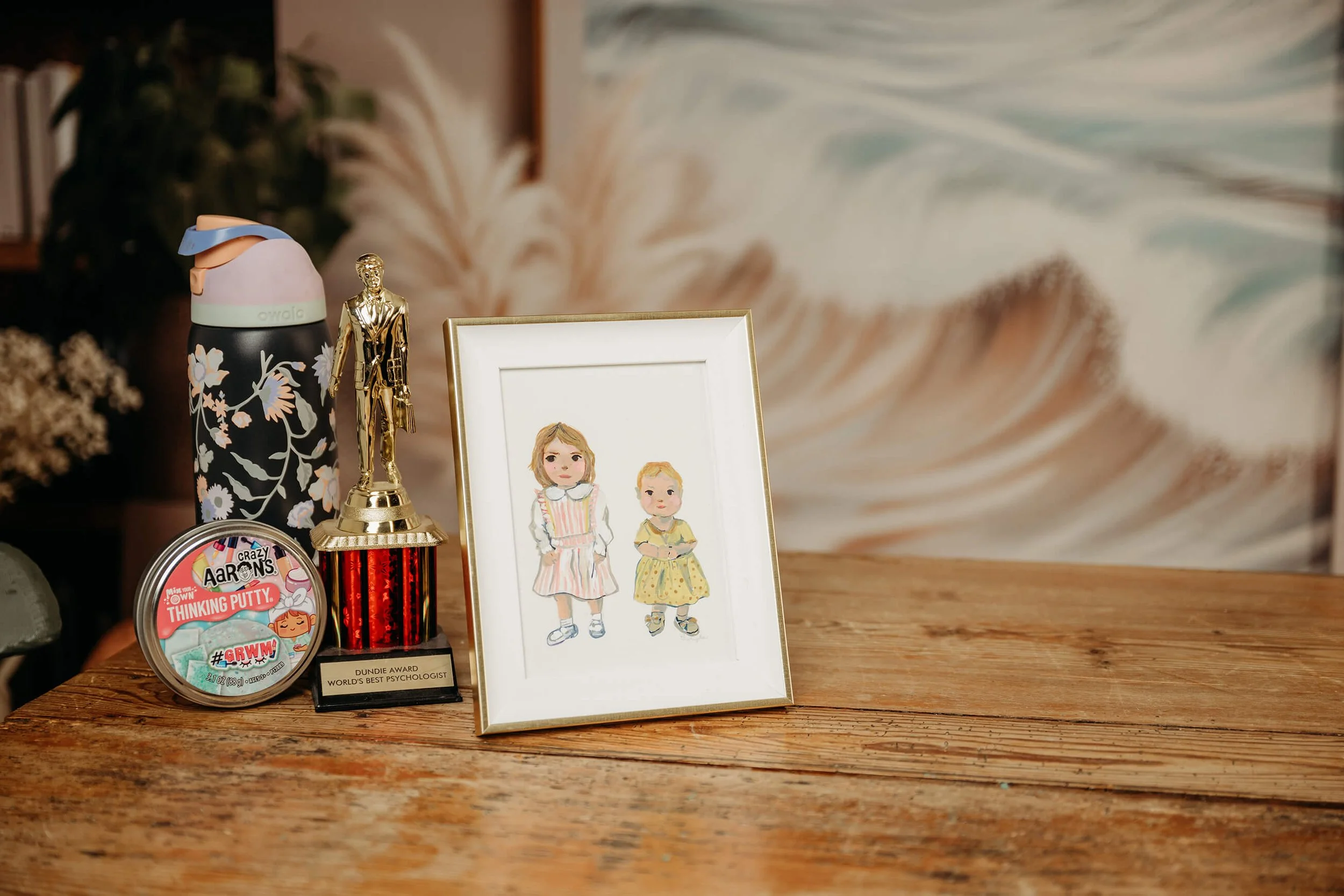 Dr. Hillary Ammon's desk with pictures and awards