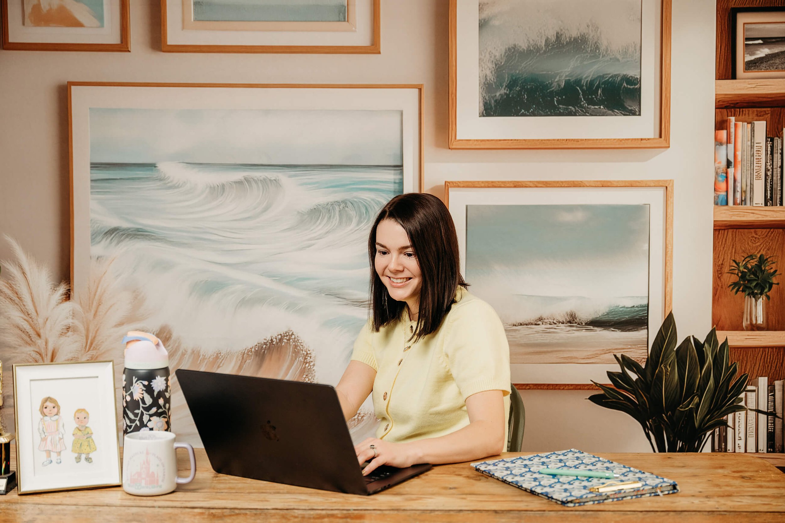 Dr. Hillary Ammon working on a computer