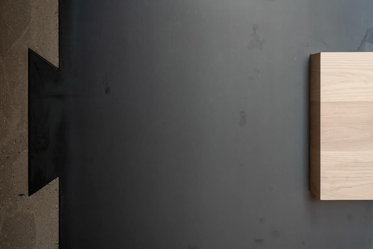 concrete-metal-wood-reception-desk-detail.jpeg