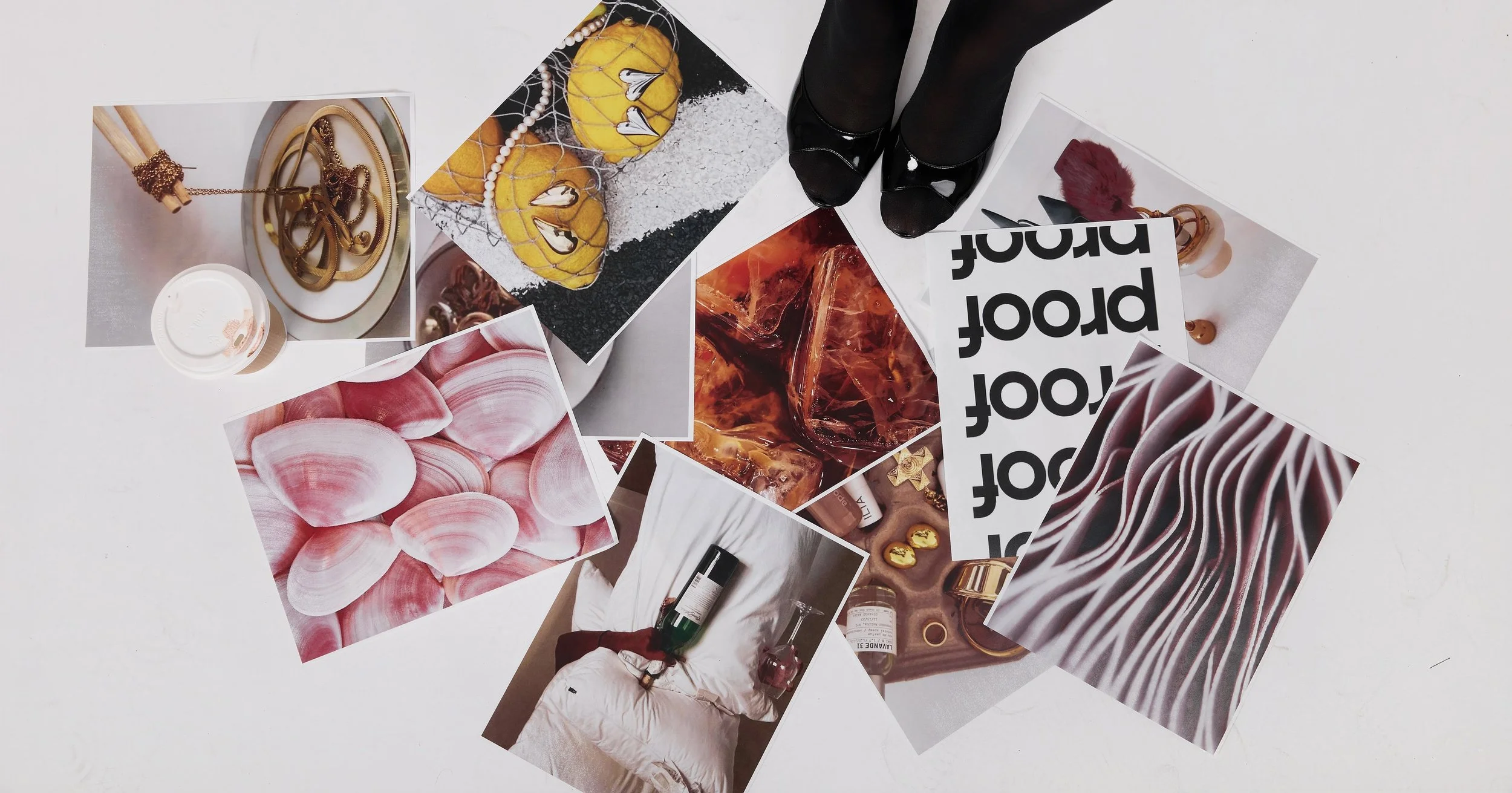 A flat lay of various photos and images scattered on a white surface, including jewelry, shells, drinks, and fashion items.