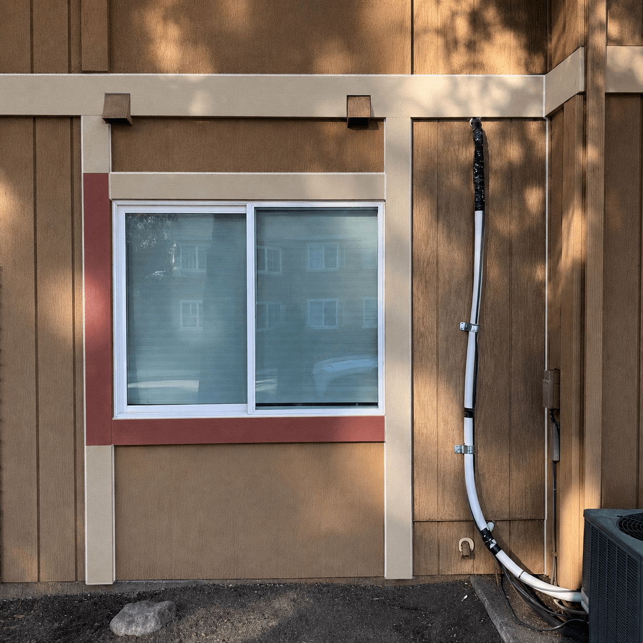 Exterior window trim installation on residential home in Stockton, CA by All About Carpentry Inc.