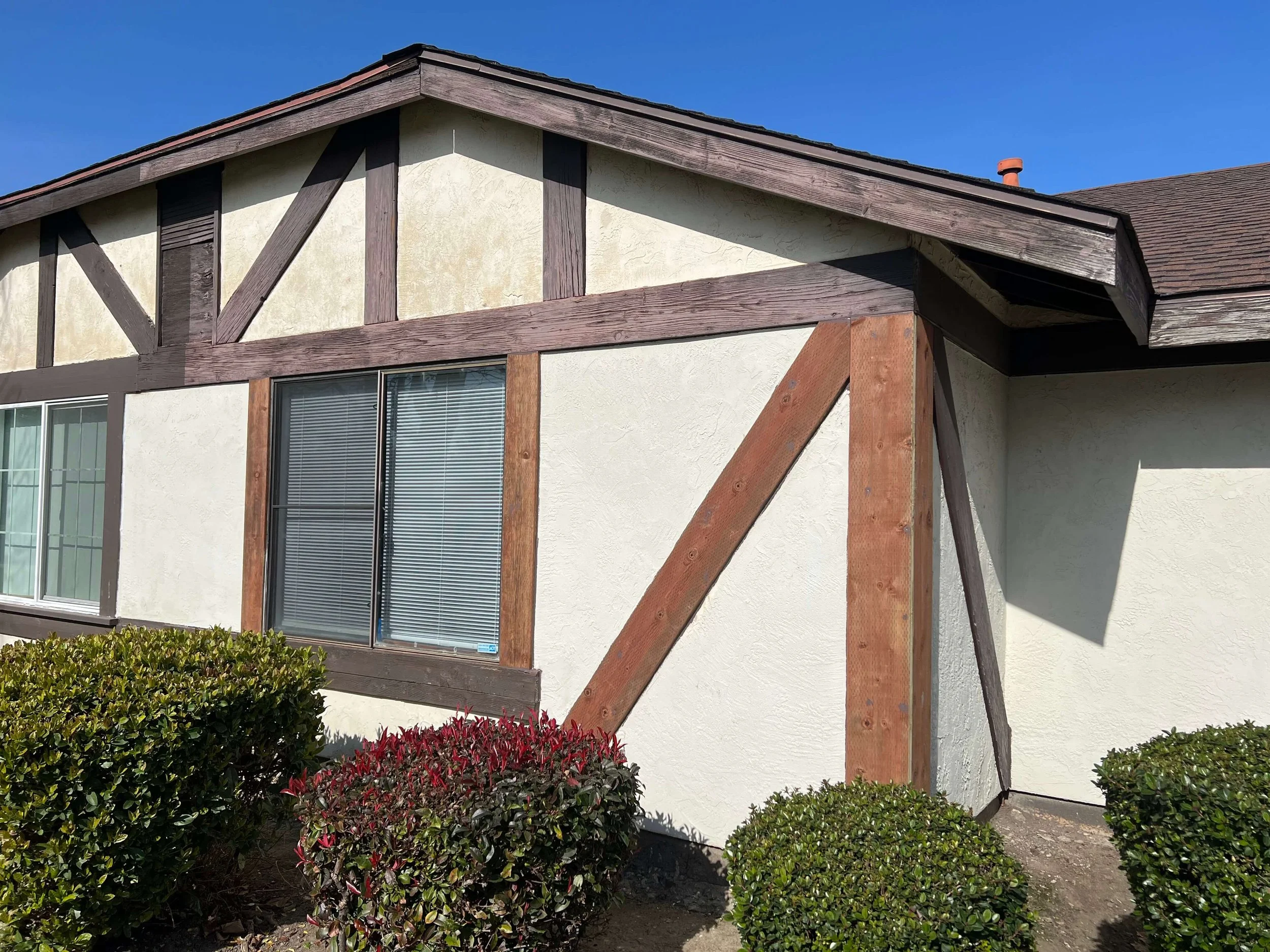 Exterior wood trim restoration and dry rot repair on a residential home in Stockton, California.