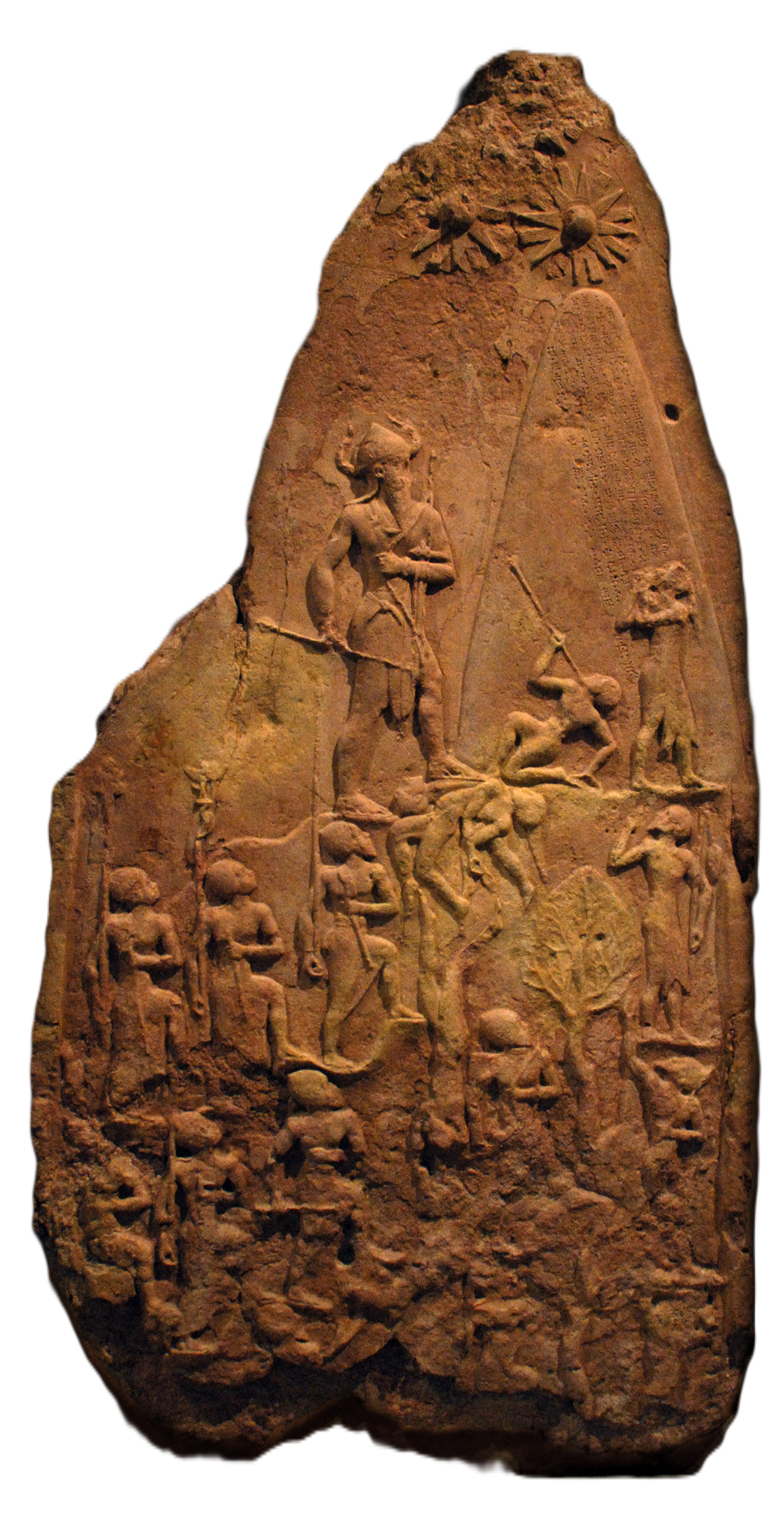 Ancient carved stone tablet depicting a scene with human figures, animals, and inscriptions.