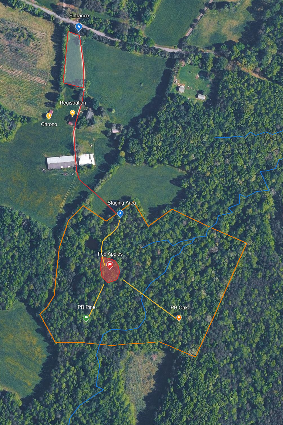 Aerial map of a farm or orchard with marked trails and areas including an entrance, registration, staging area, apple trees labeled Fob Apples, and different sections labeled PB Pine and PB Oak, surrounded by dense trees and fields.