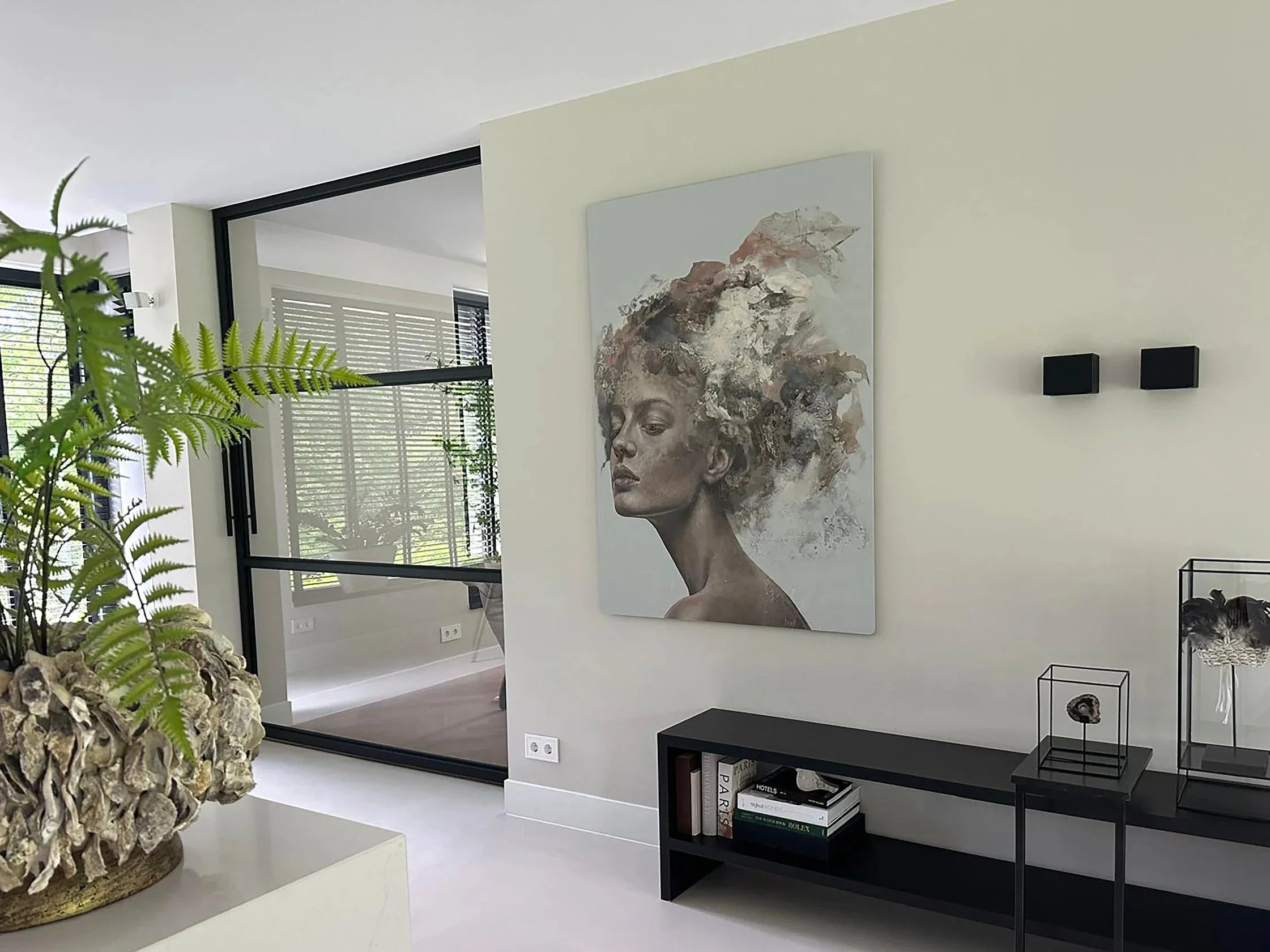 Contemporary abstract portrait of a female figure by Iris Schreven, soft tones, realistic features, layered textures and ethereal composition in room of collector
