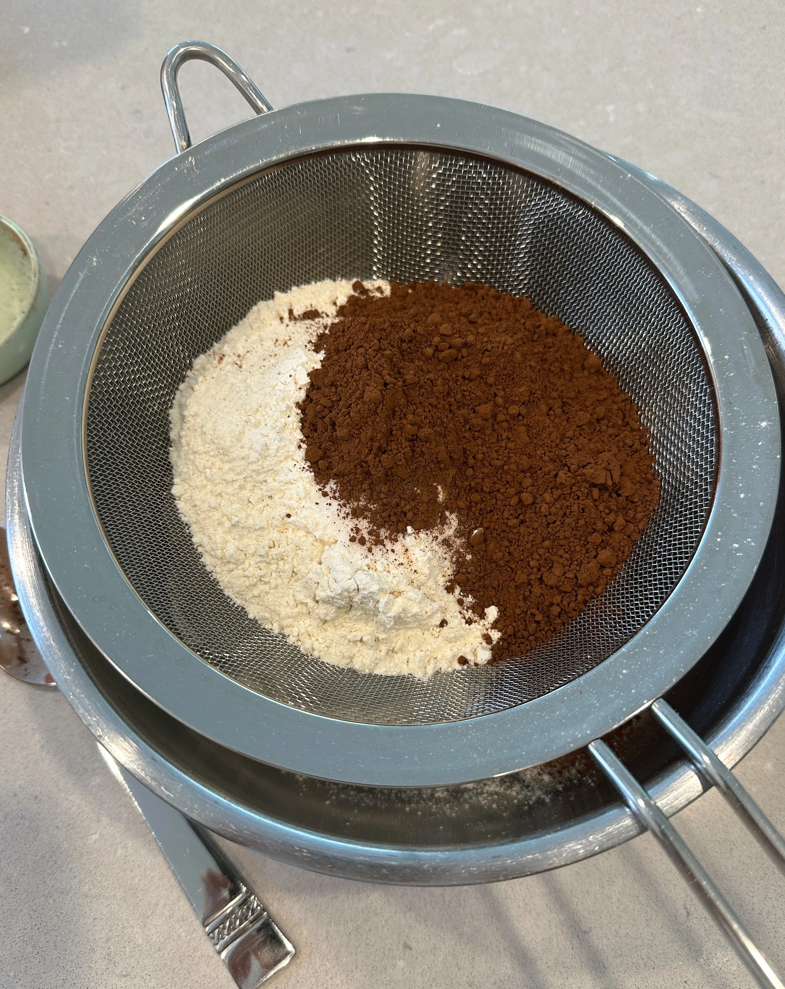 A mesh strainer helps to sift it all