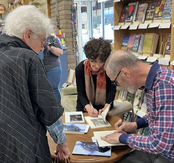  Barbara Rockman and I sign books after launching our new poetry collections together. 10-23-26. 