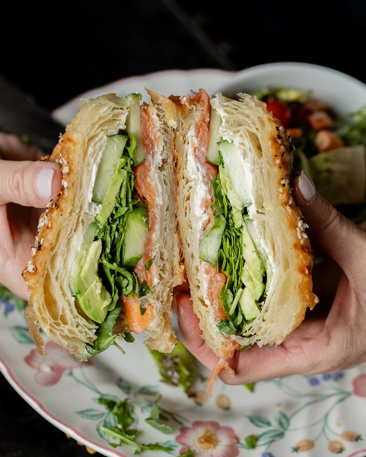 Enjoying a fresh made sandwich from Olive Branch