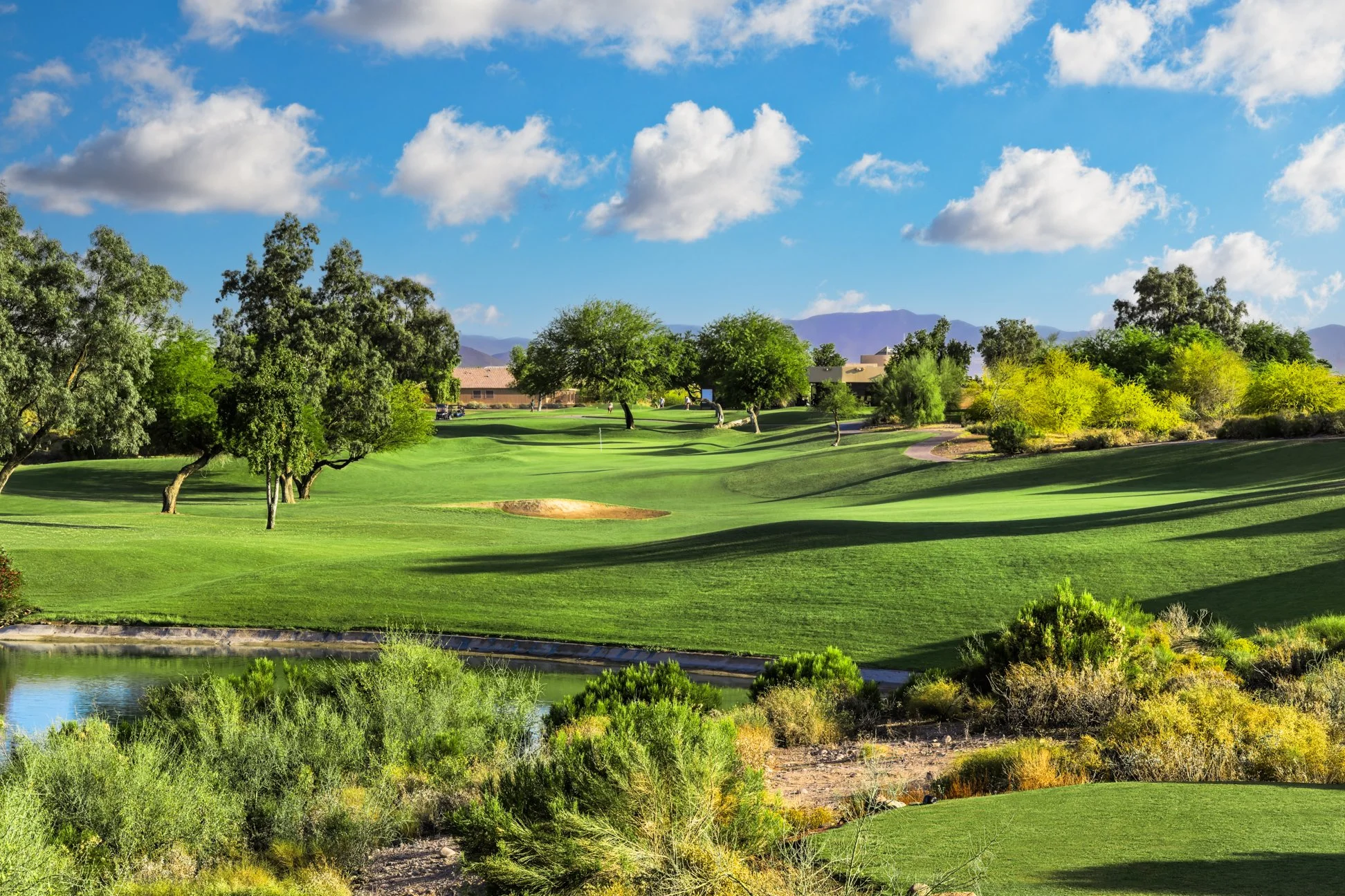 View of the clubhouse and golf course at Coyote Lakes Golf Club in Surprise, Arizona.