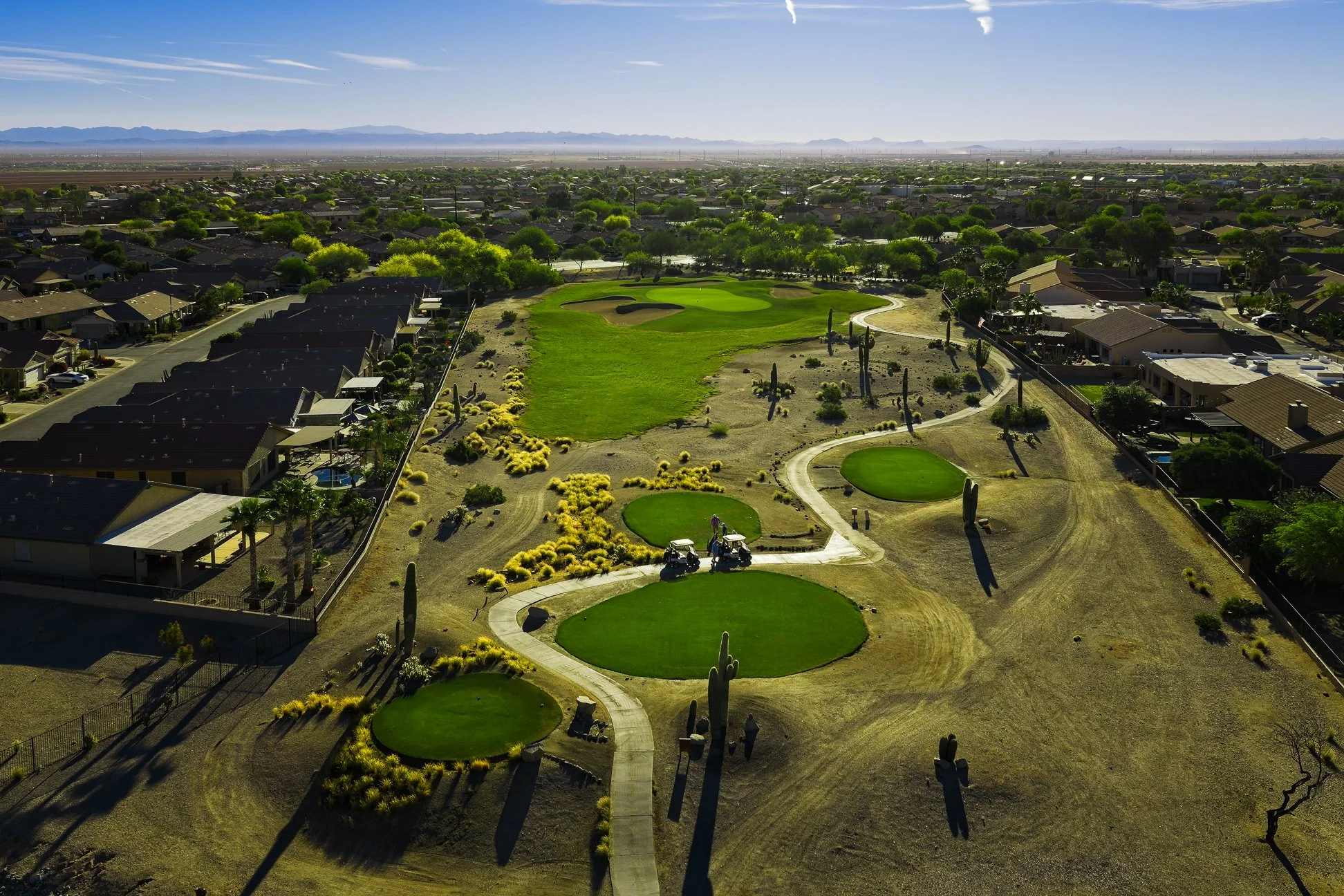 Aerial view of the tee boxes and residential neighbourhood at San Tan Highlands Golf Club in San Tan Valley, Arizona.