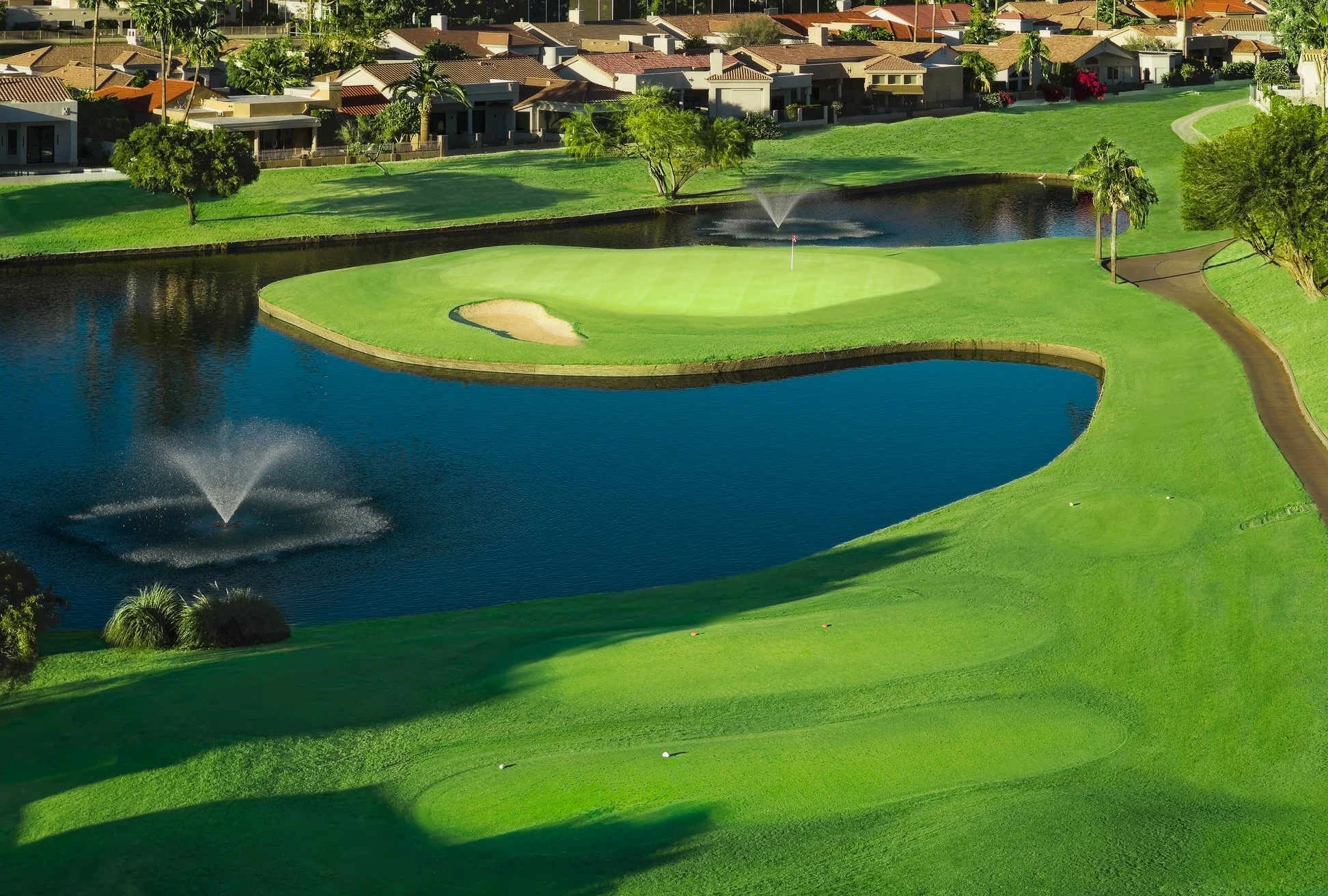 An aerial view of a pond and water feature at Scottsdale Country Club in Scottsdale, Arizona.